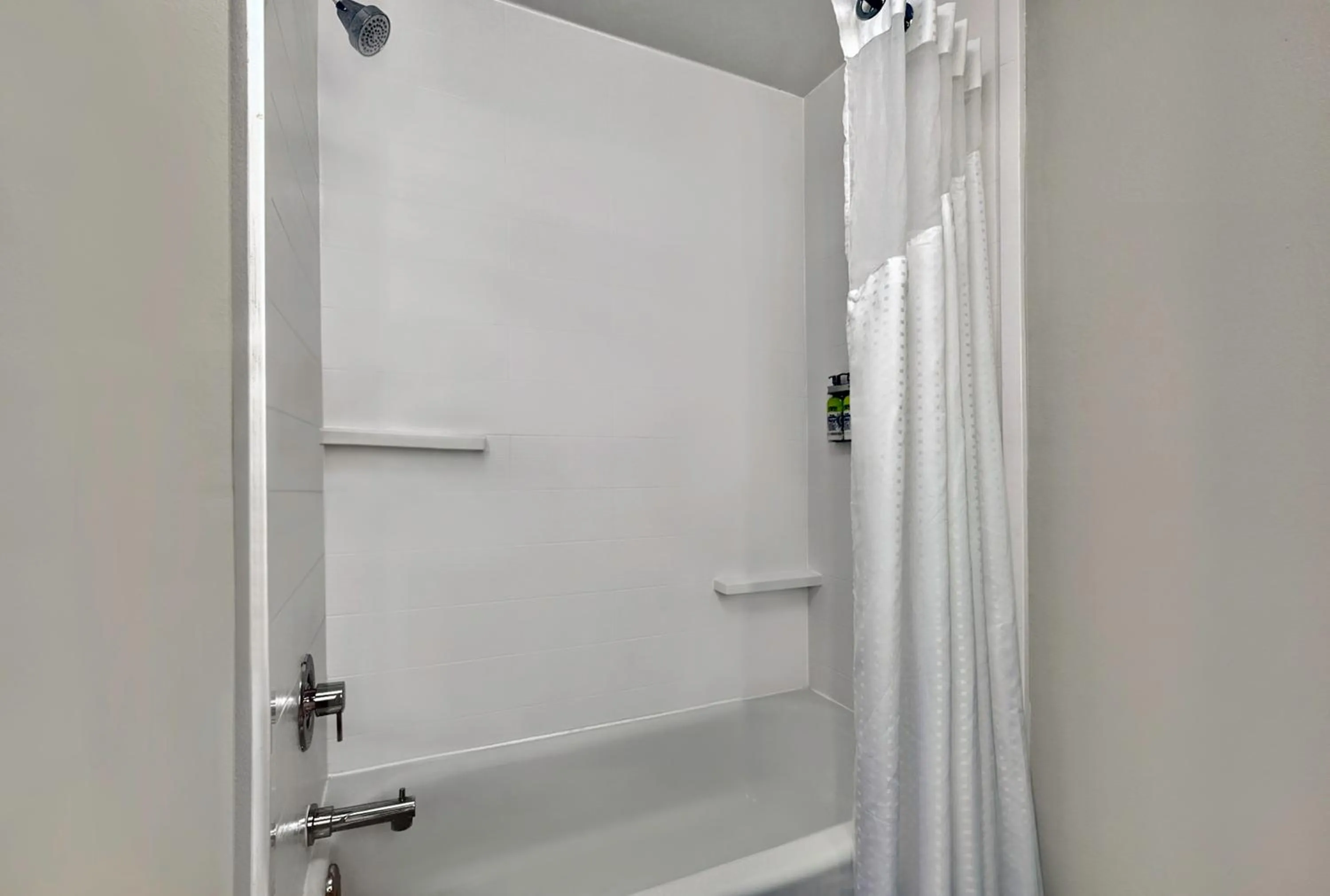 Bathroom in Holiday Inn Express & Suites Kansas City Airport by IHG