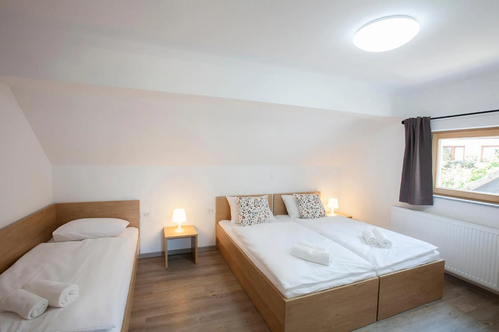 Bed in 1861 Blejka apartments Bled