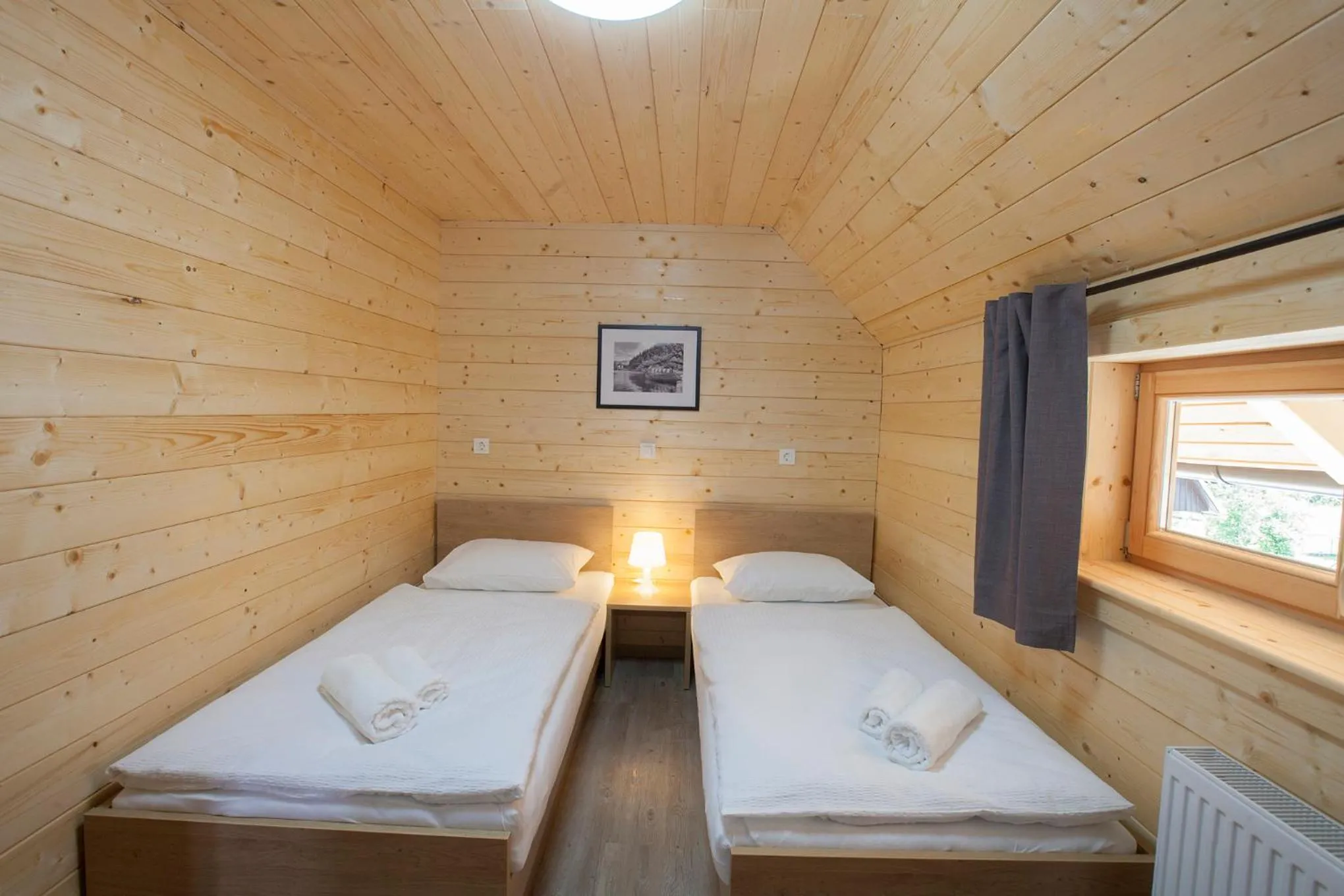 Bed in 1861 Blejka apartments Bled