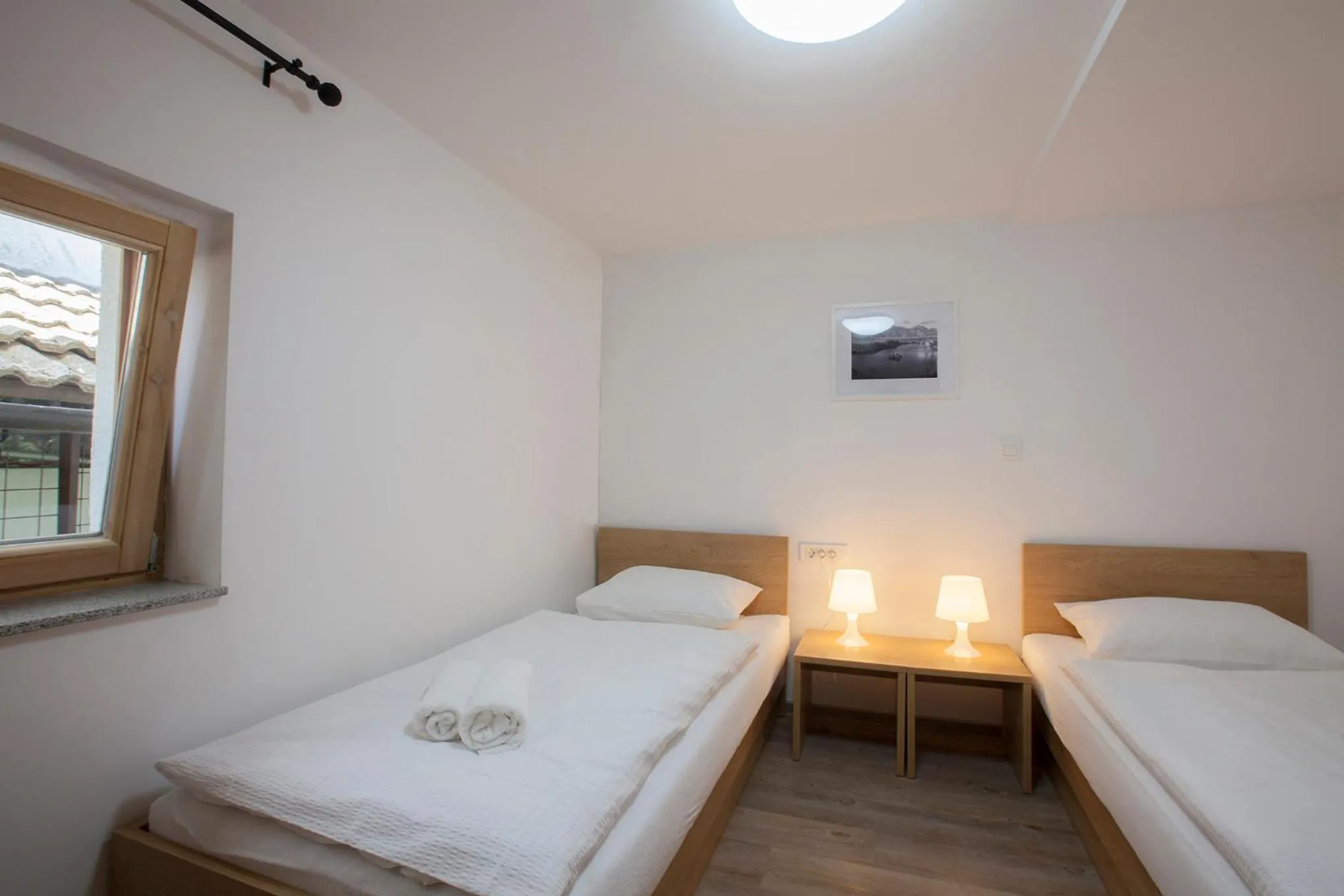 Bed in 1861 Blejka apartments Bled