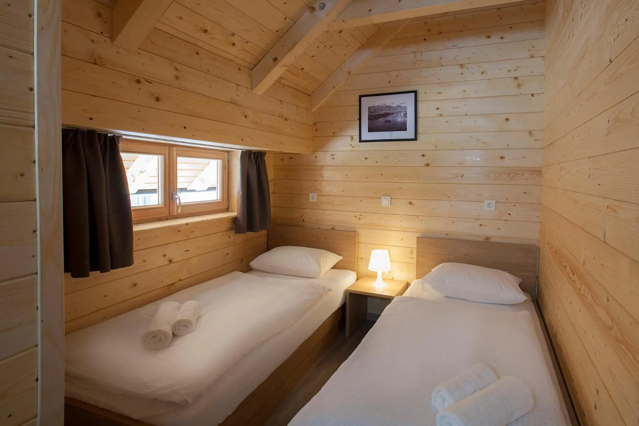 Bed in 1861 Blejka apartments Bled