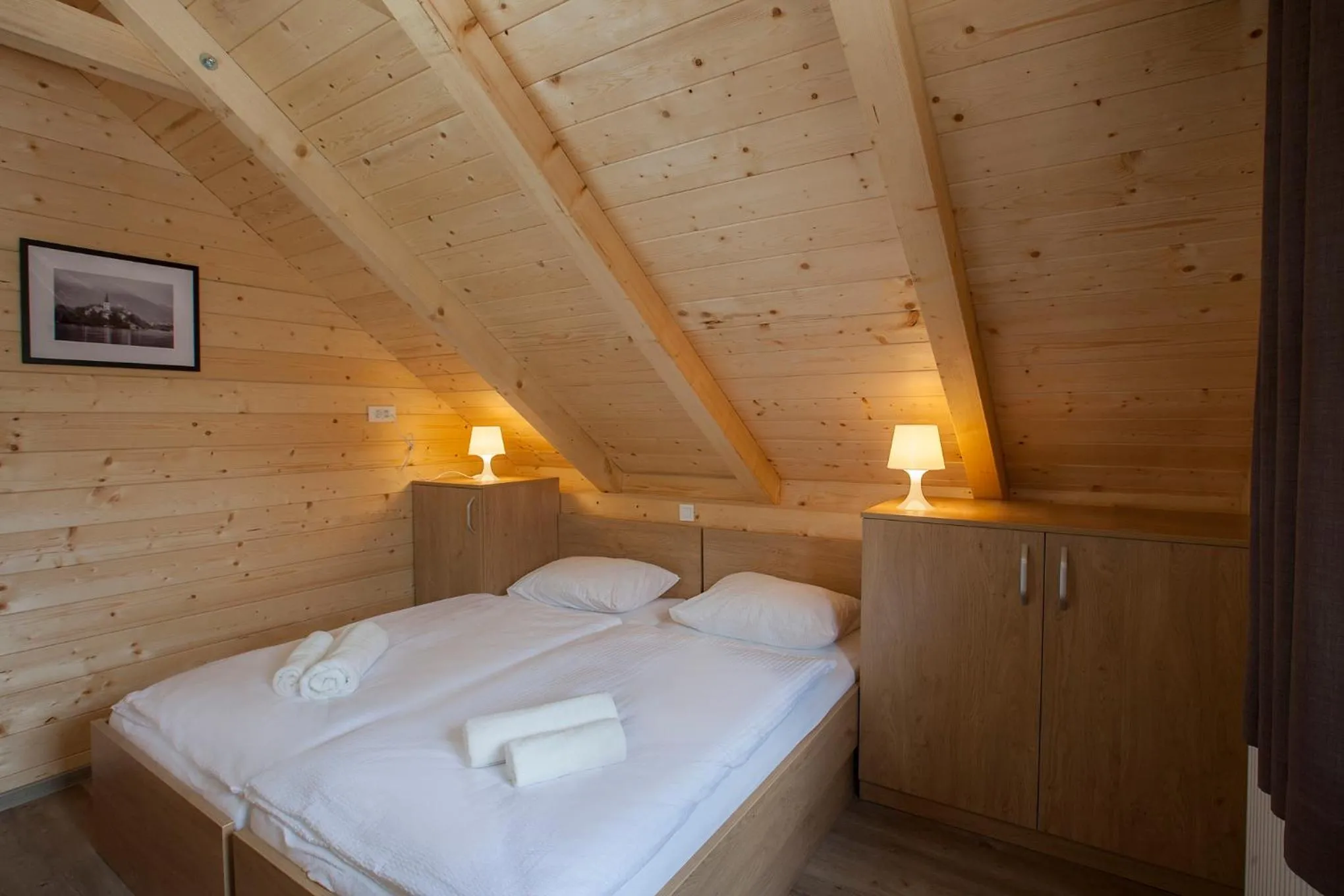 Bed in 1861 Blejka apartments Bled