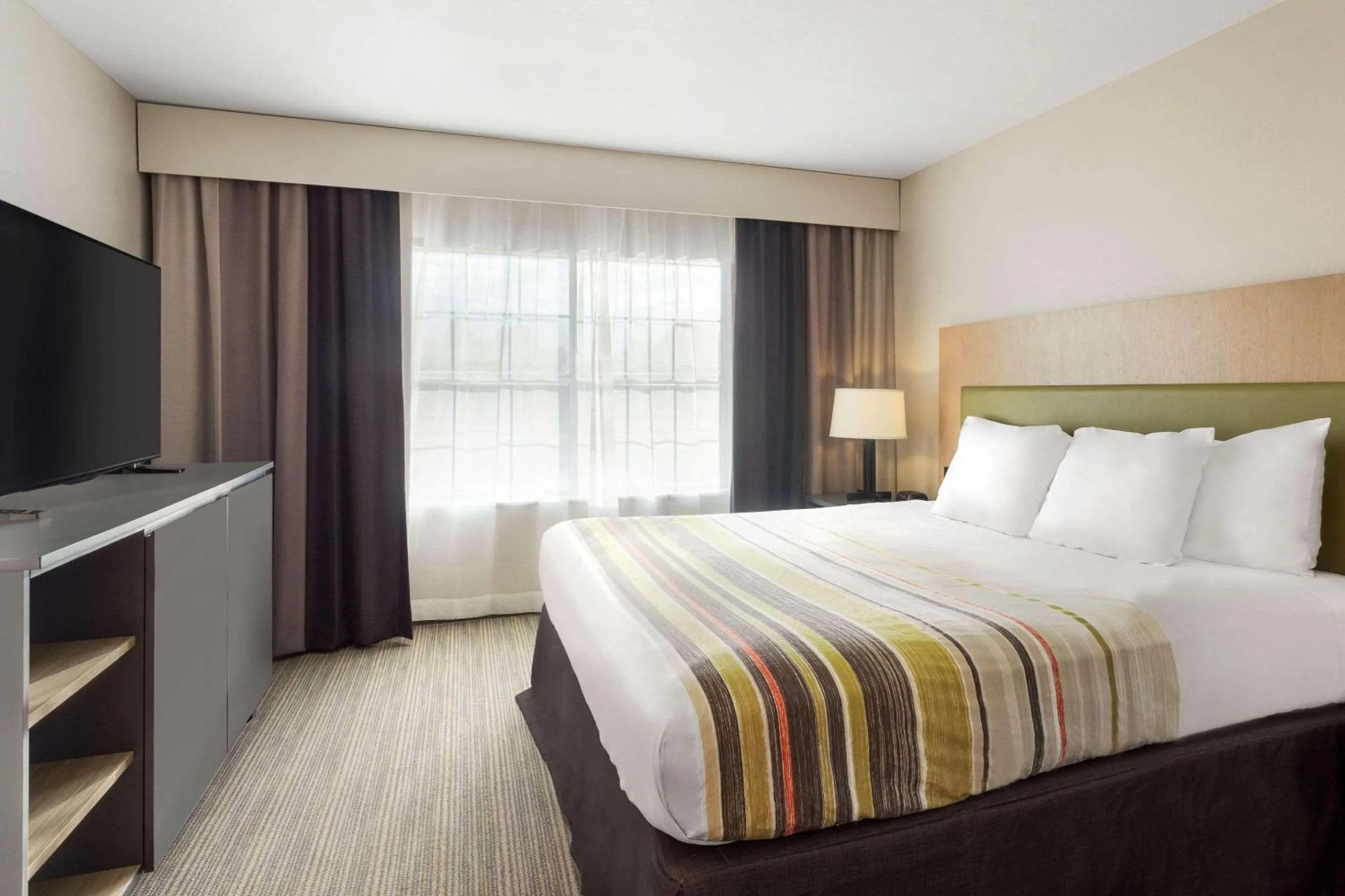 Bedroom, Bed in Country Inn & Suites by Radisson, Jackson-Airport, MS