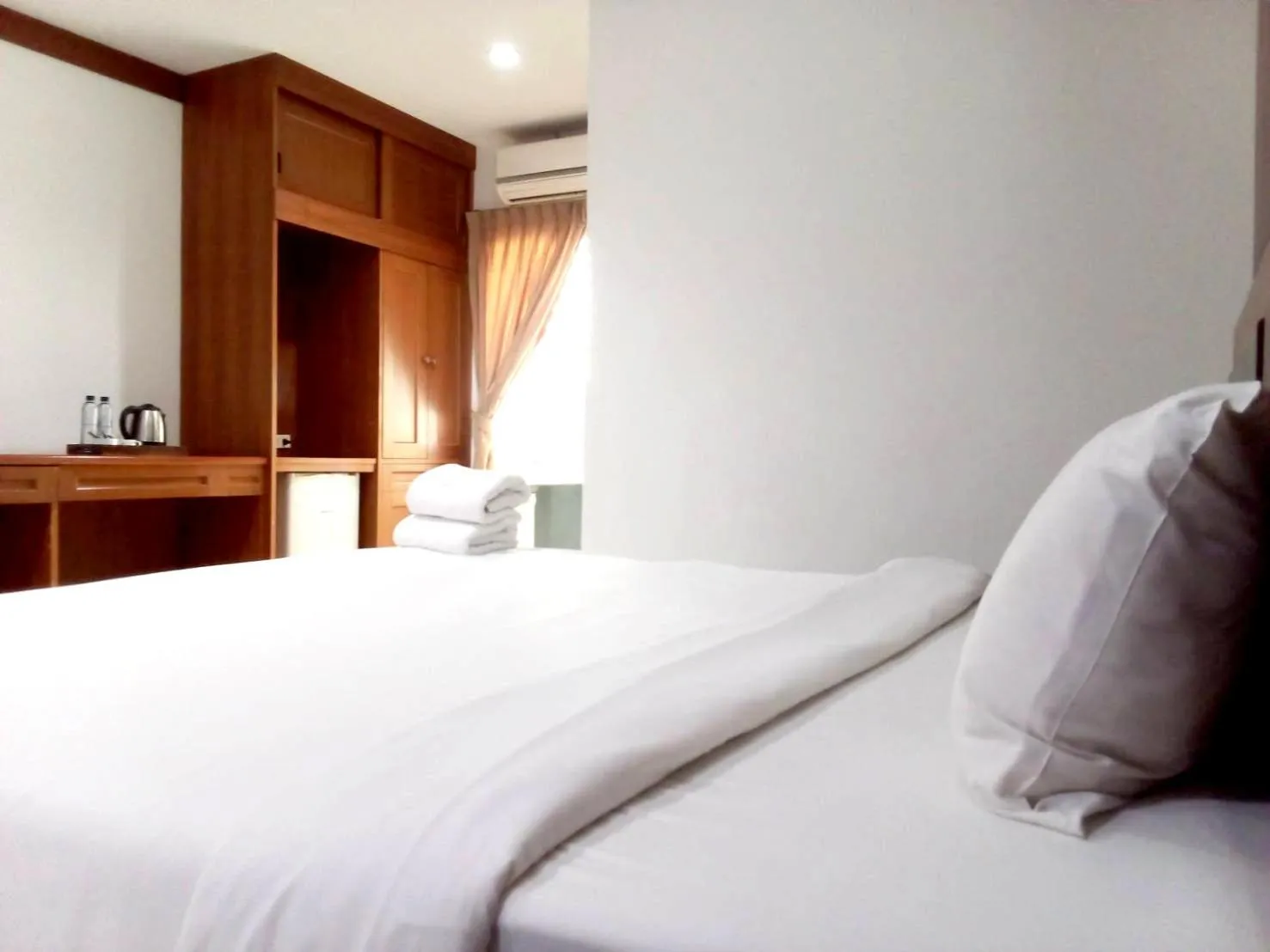 Photo of the whole room, Bed in SB Living Place Hotel Phuket Town