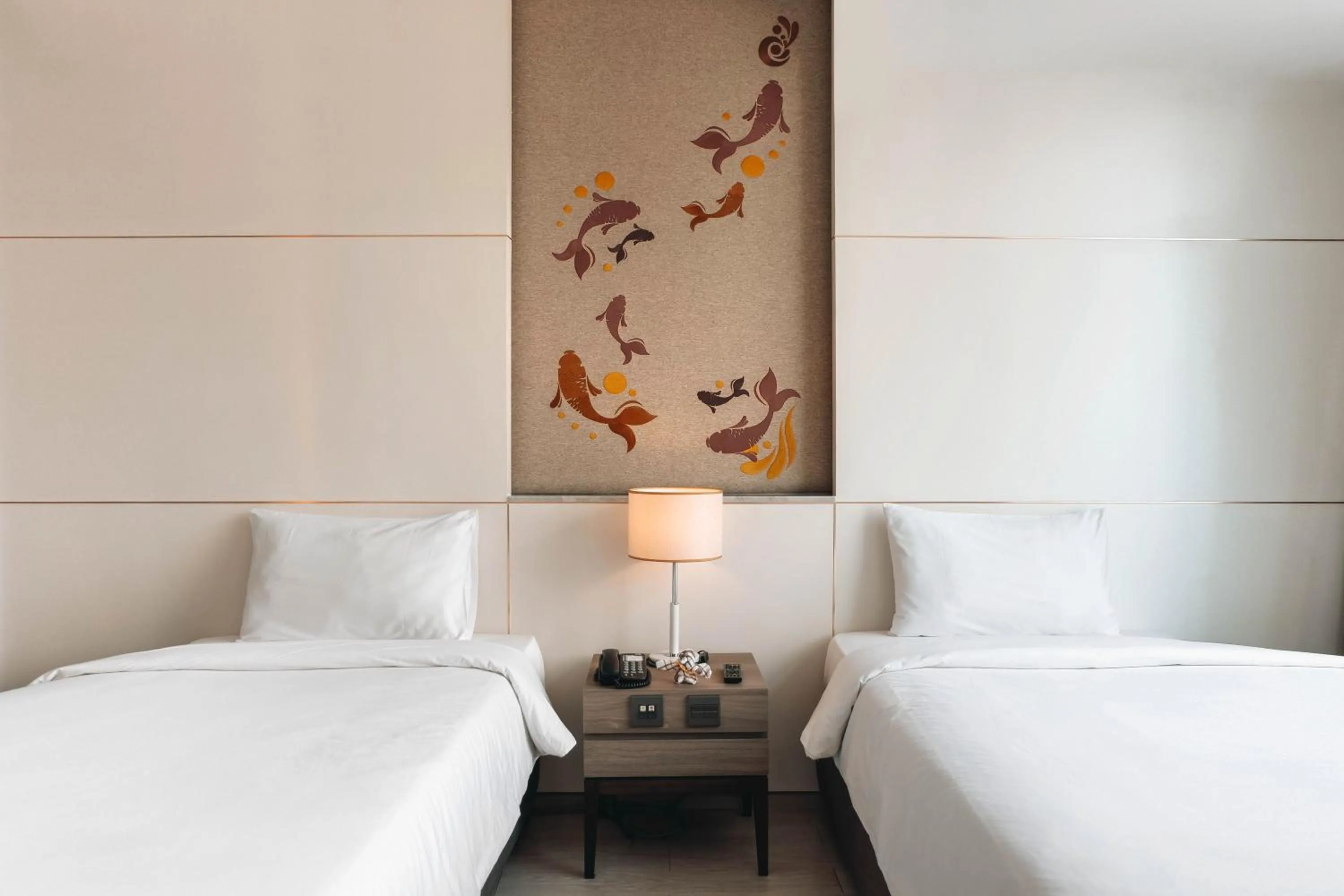 Bed in Jasmine 59 Hotel