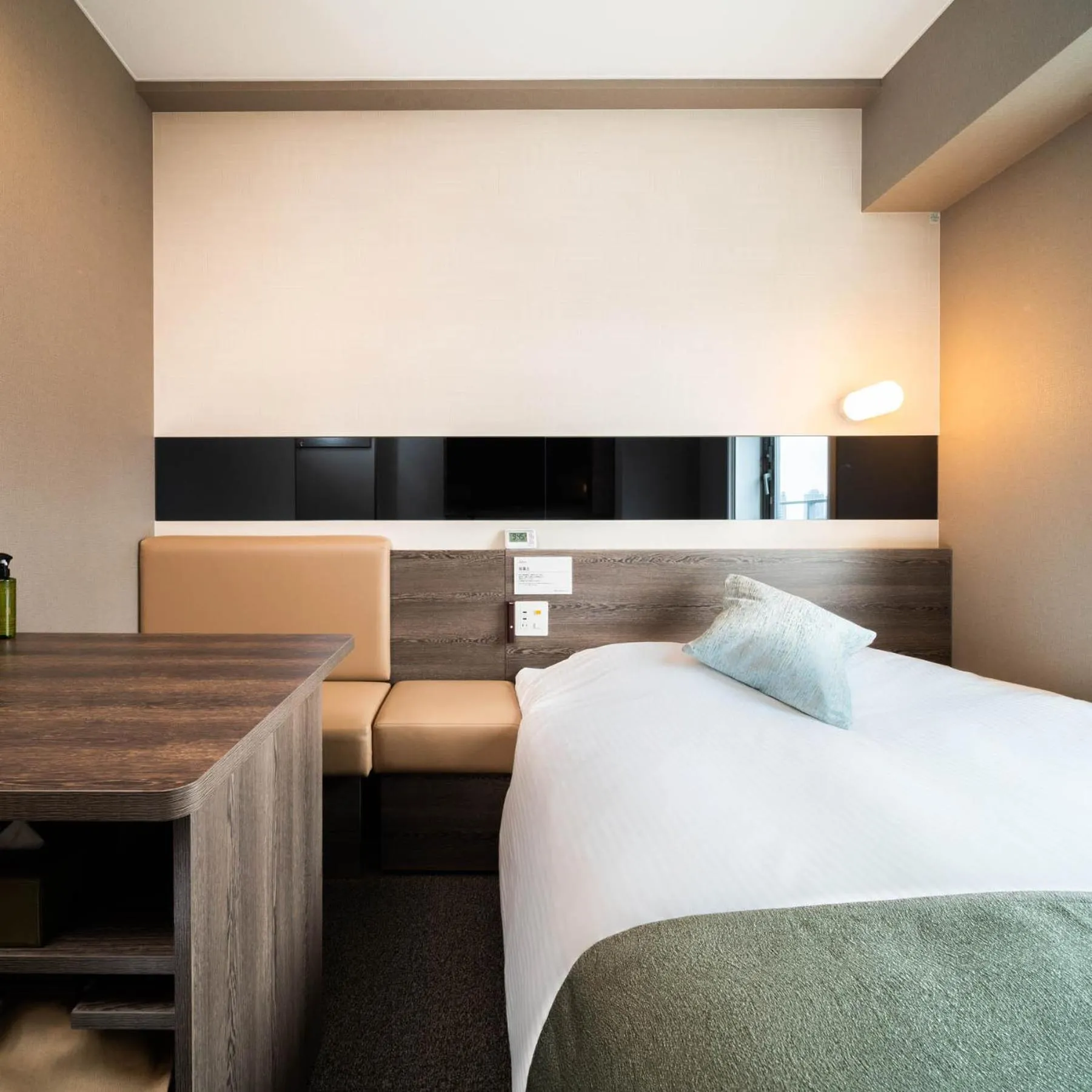 Bed in Super Hotel Premier Ginza