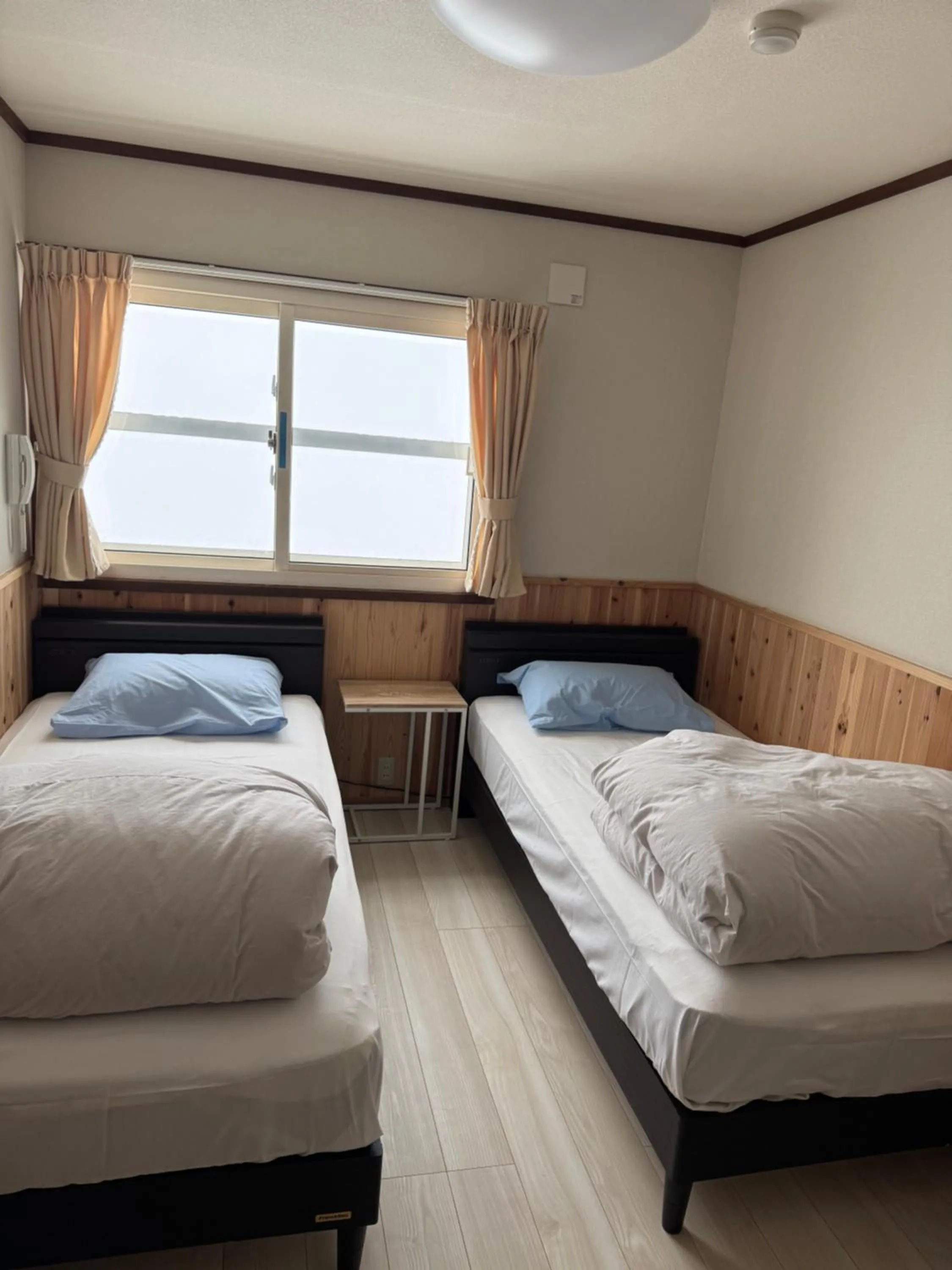 Bed in Tengudaira Mountain Lodge