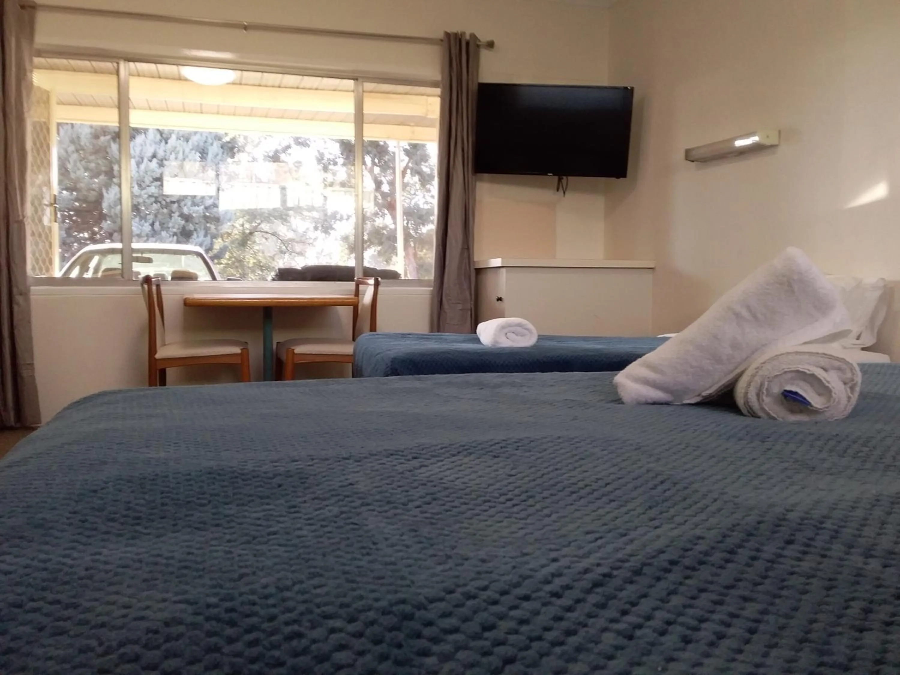 Bed in Green Door Motel