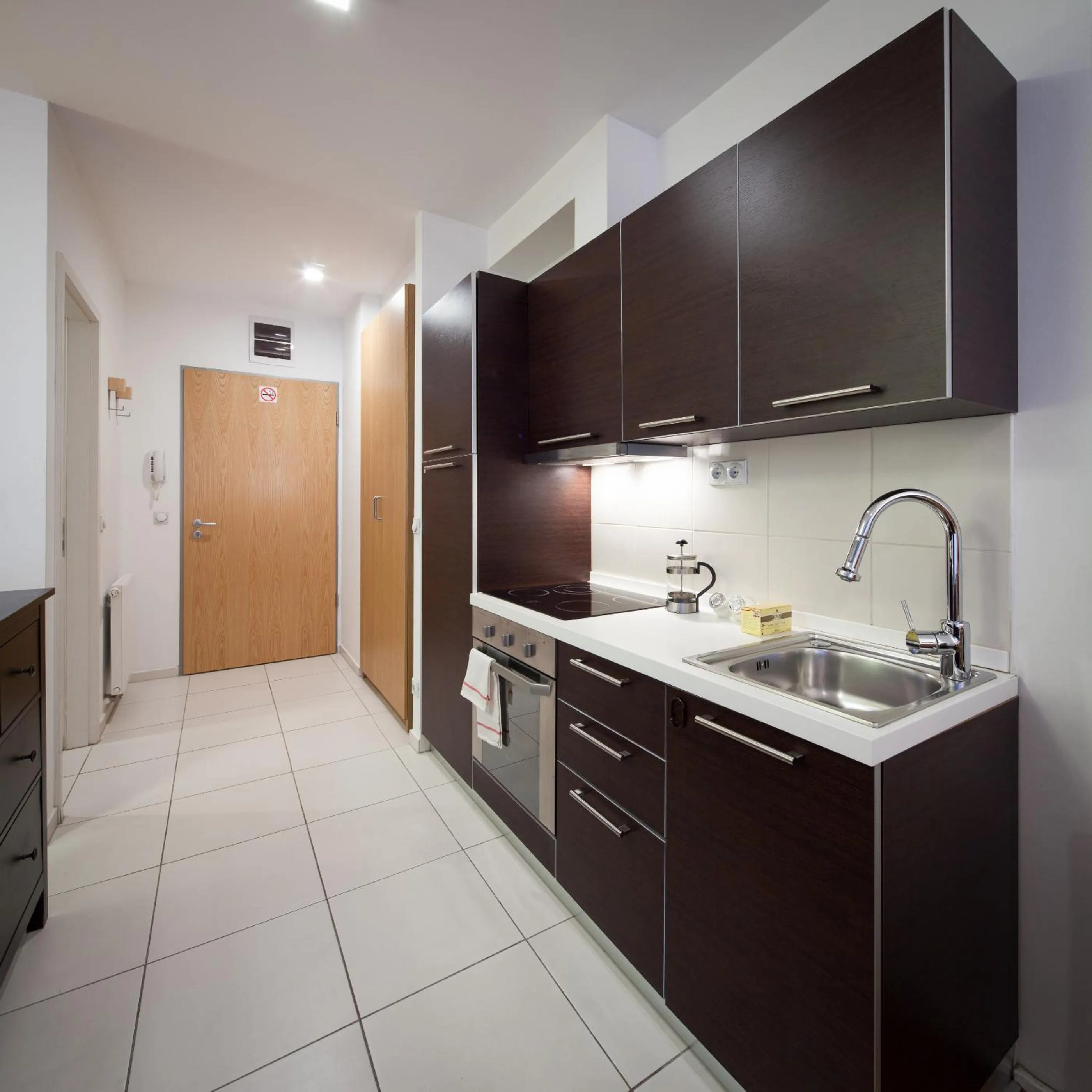 Kitchen or kitchenette in Quality Point Apartments 0-24 reception