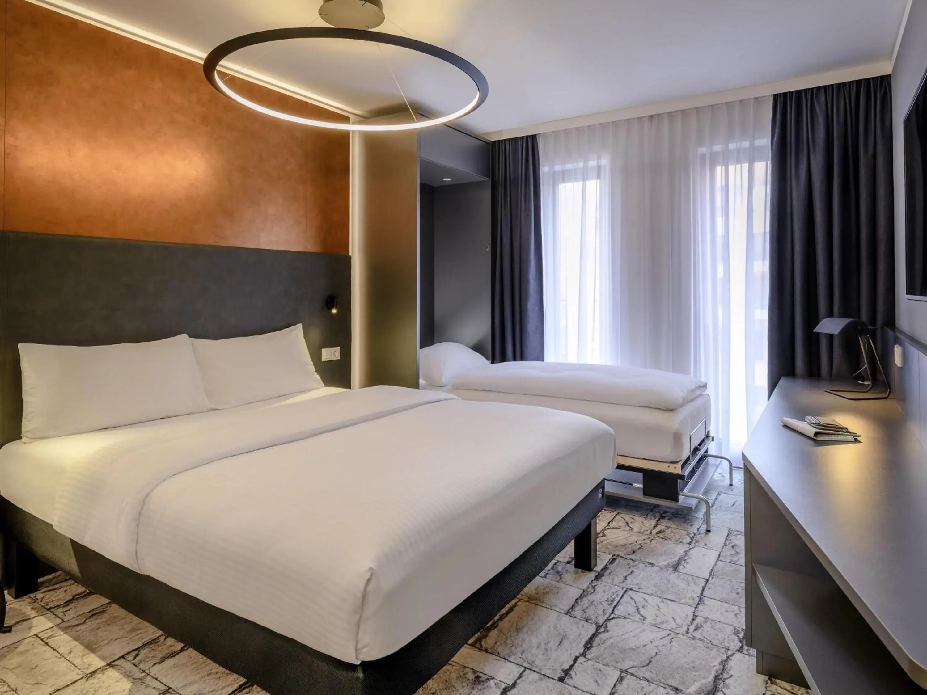 Family Room with One Double Bed and One Single Bed in ibis Styles Bamberg Family Room with One Double Bed and One Single Bed in ibis Styles Bamberg