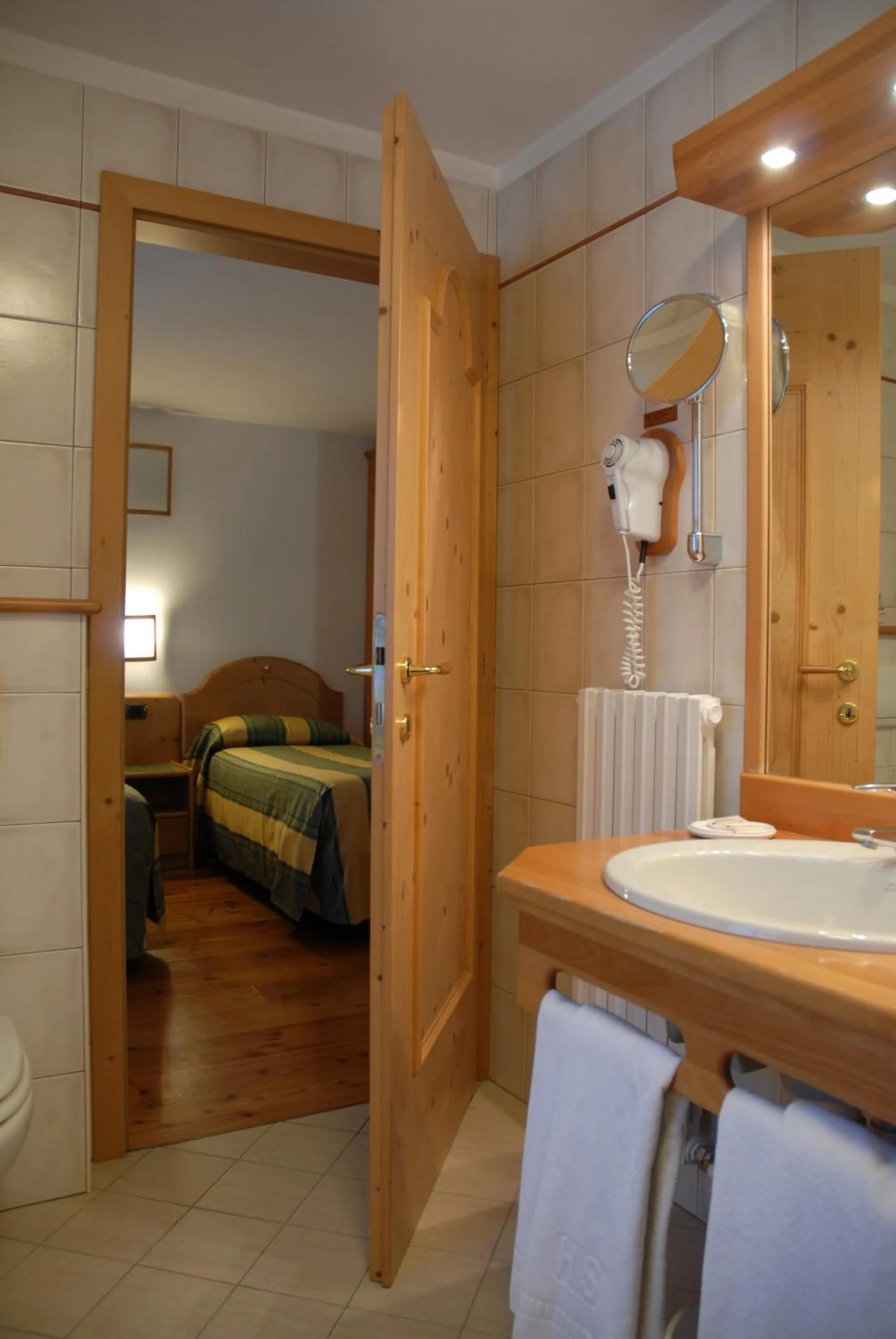 Bathroom, Bed in Hotel Sport