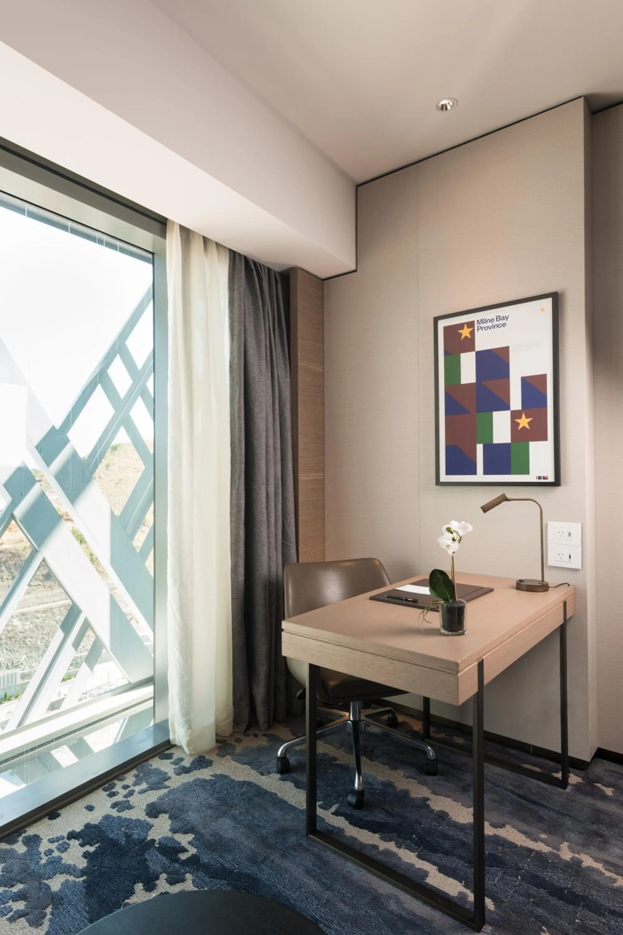 Communal lounge/ TV room in Hilton Port Moresby Hotel & Residences