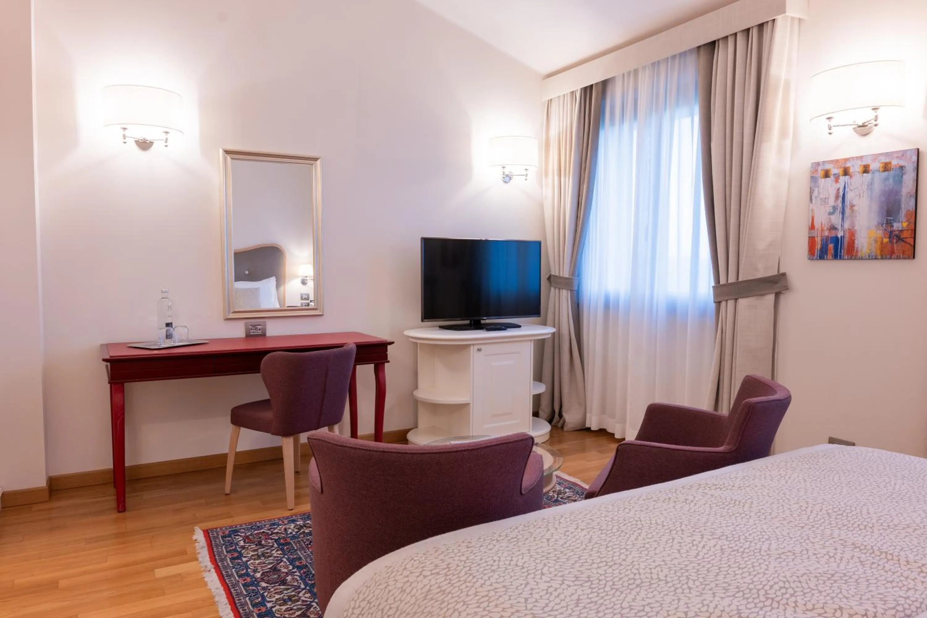 Seating area, Bed in Borgo La Chiaracia Resort & SPA