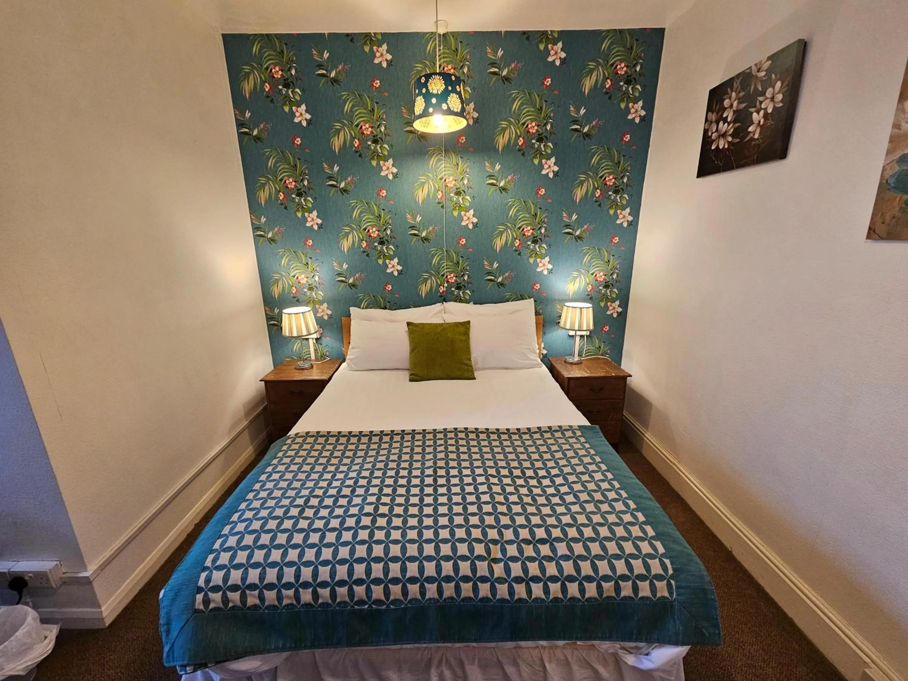 Bed in Rivelyn Hotel Bar & Restaurant