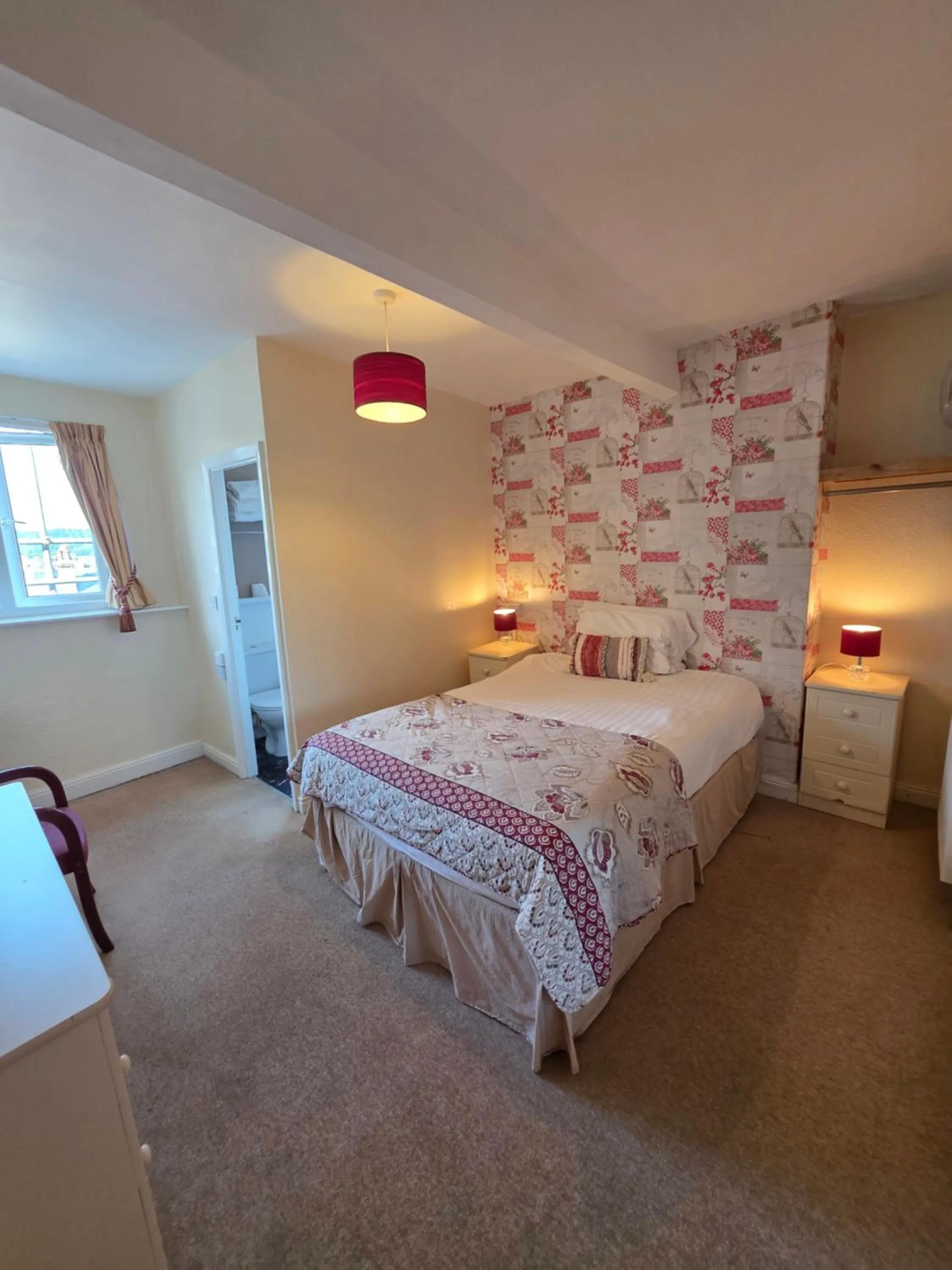 Bed in Rivelyn Hotel Bar & Restaurant