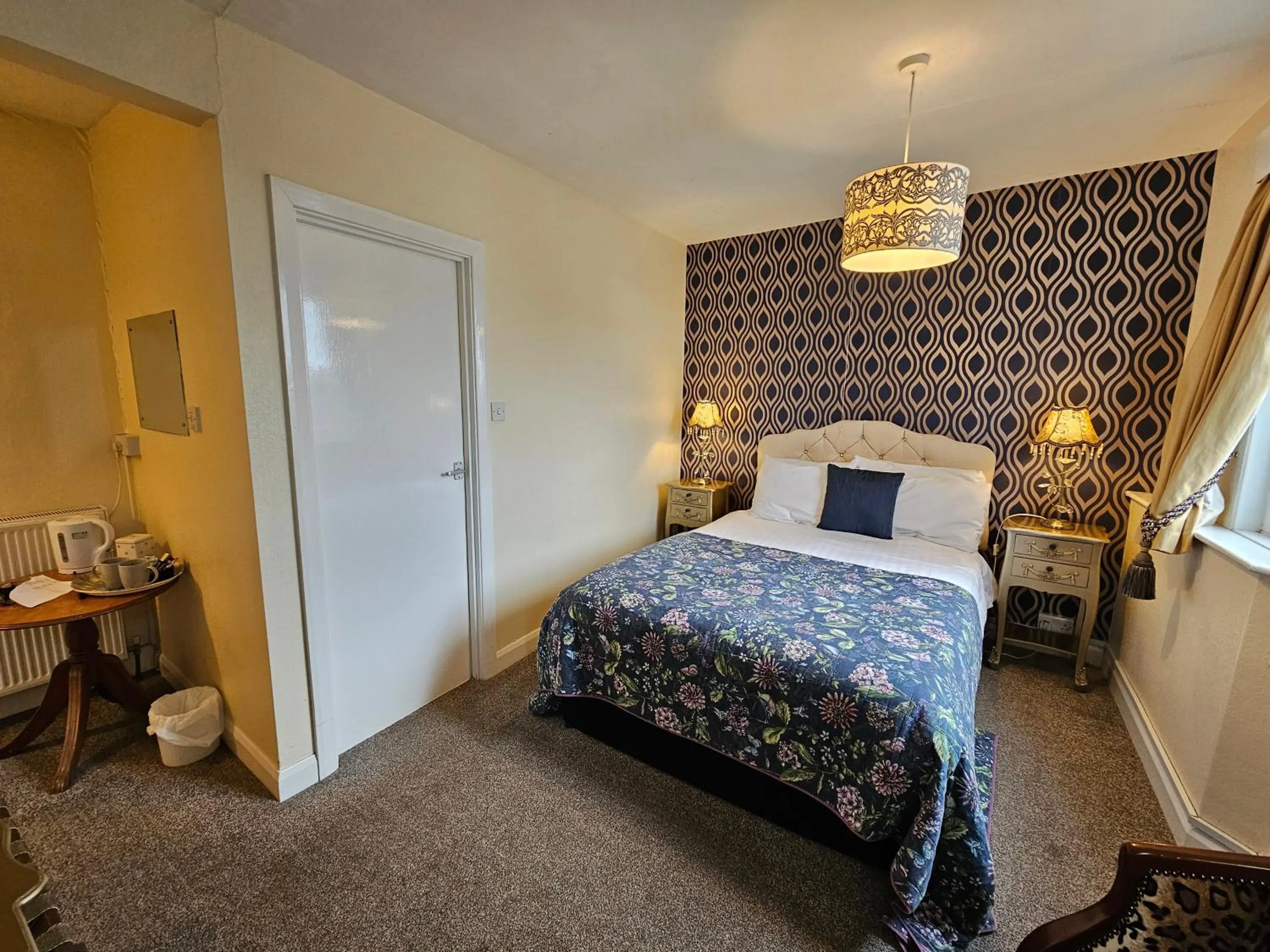 Bed in Rivelyn Hotel Bar & Restaurant