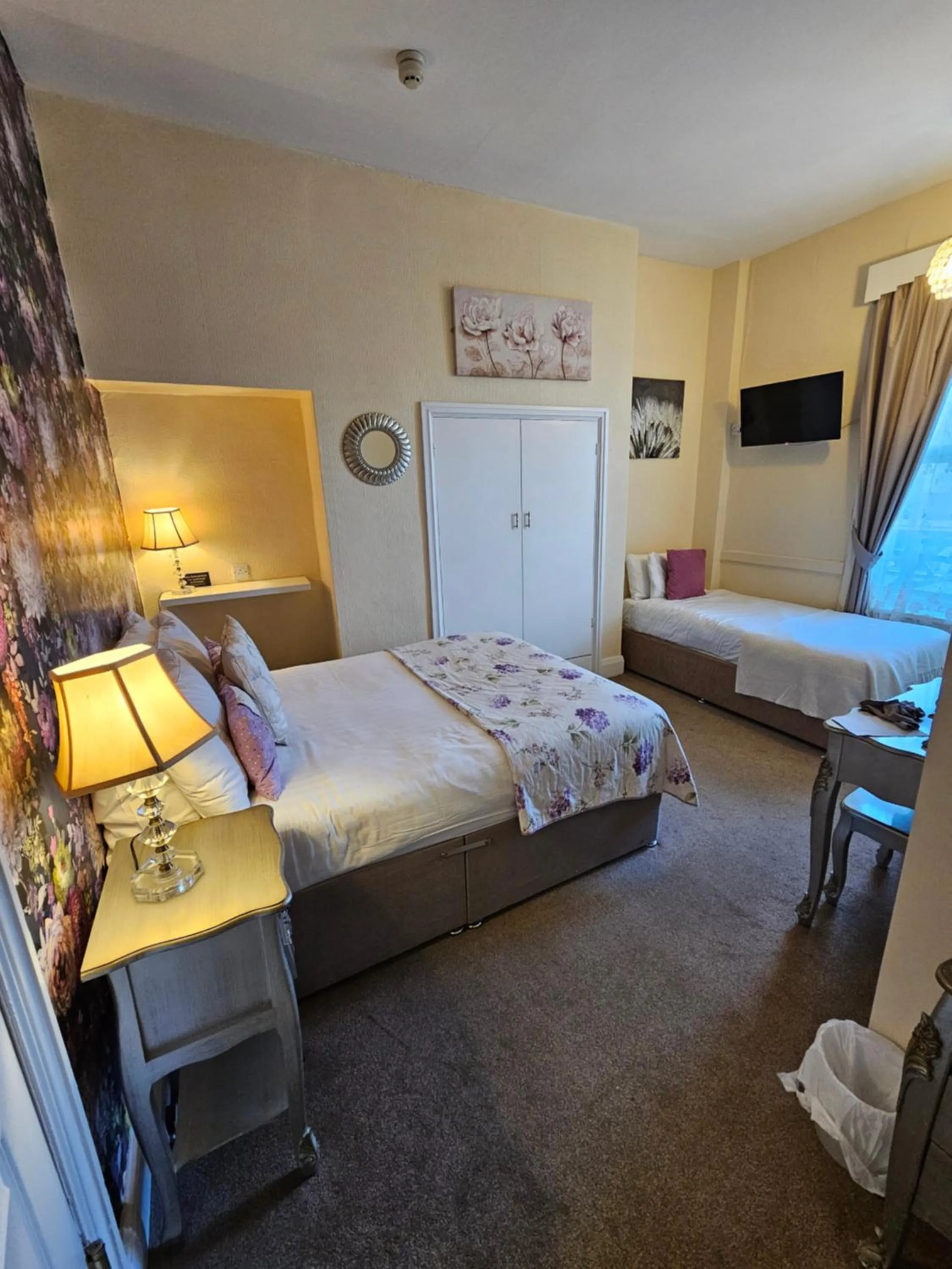 Bed in Rivelyn Hotel Bar & Restaurant