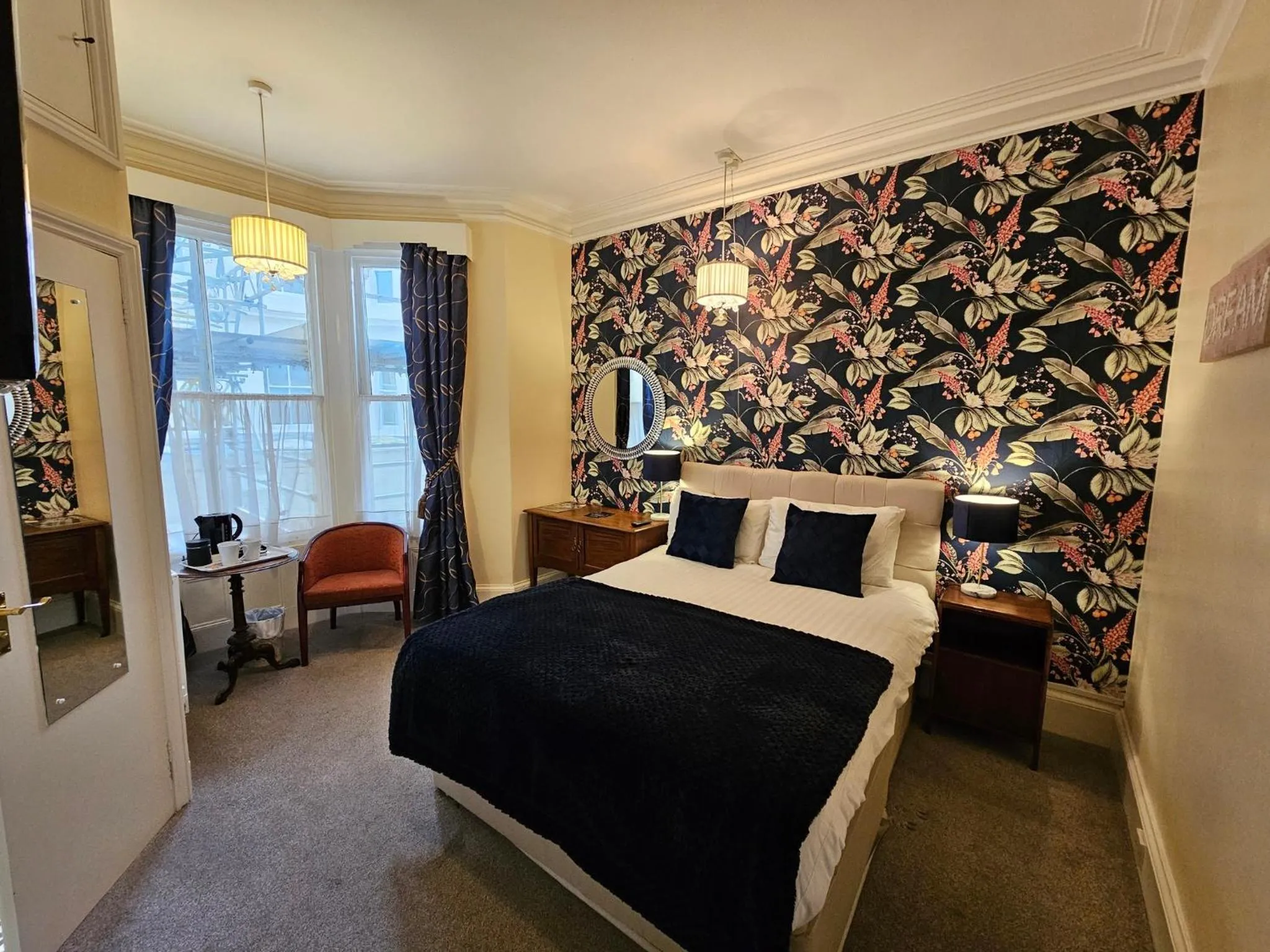 Bed in Rivelyn Hotel Bar & Restaurant