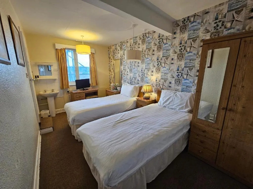 Bed in Rivelyn Hotel Bar & Restaurant