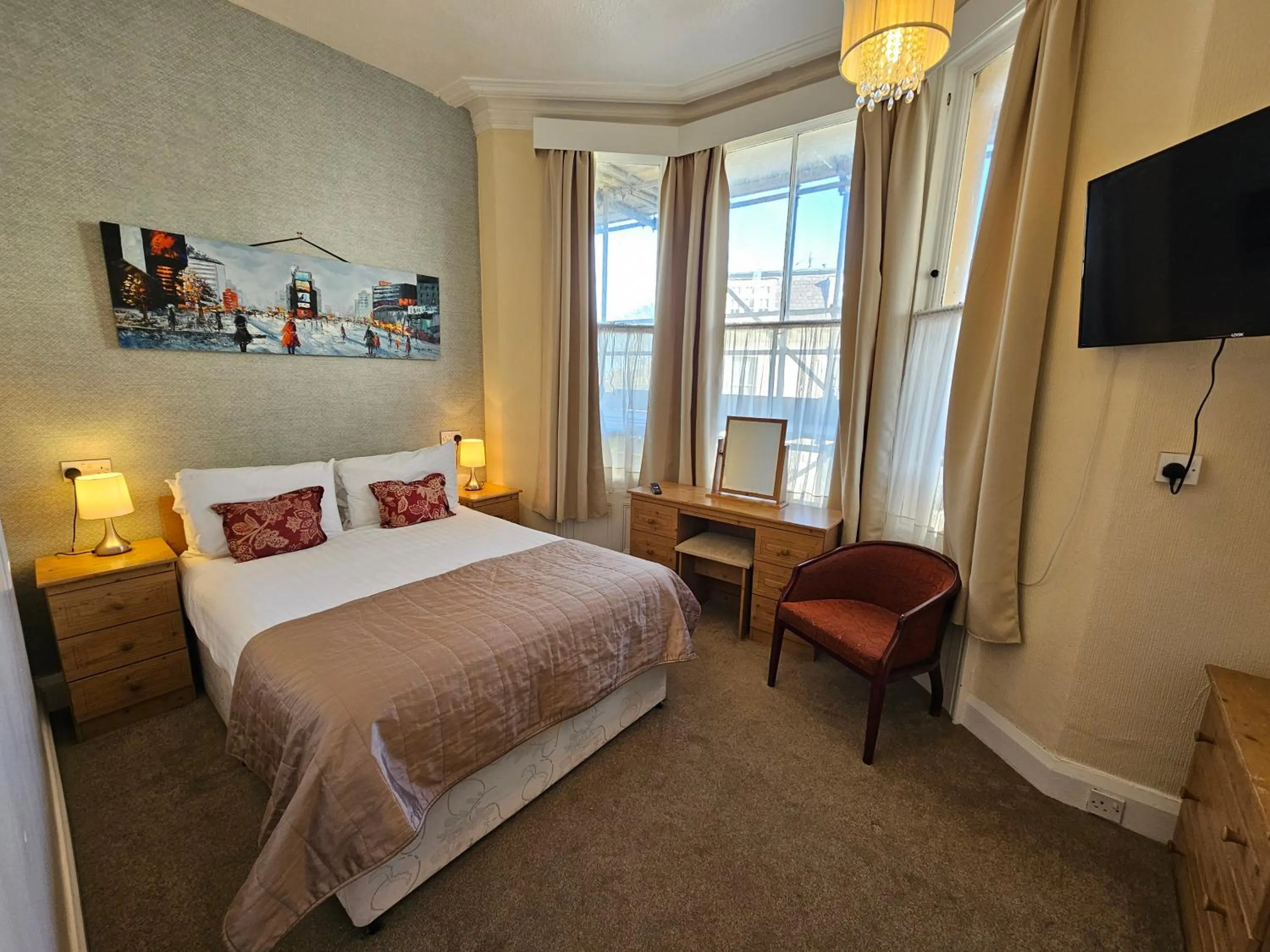 Bed in Rivelyn Hotel Bar & Restaurant