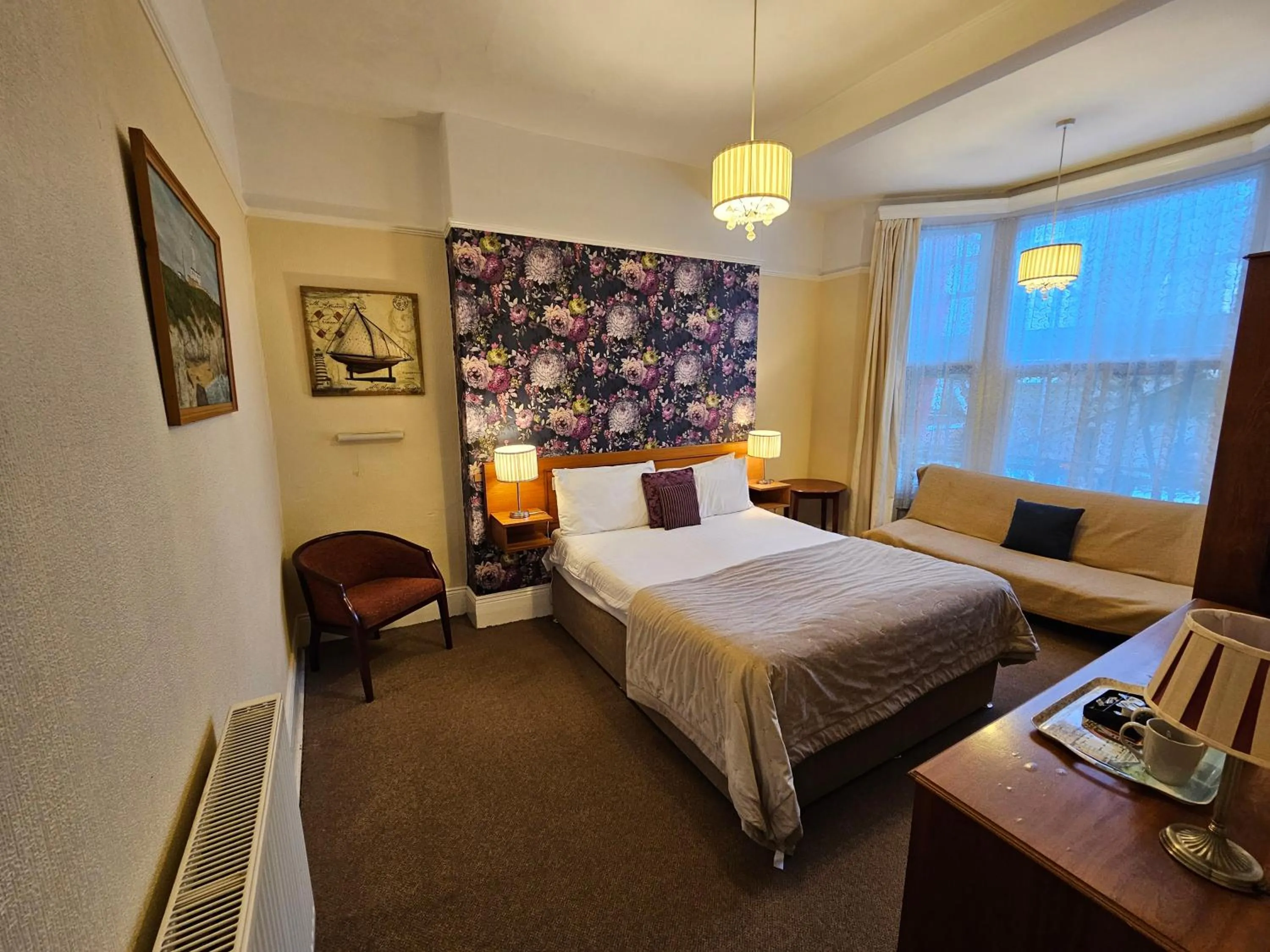 Bed in Rivelyn Hotel Bar & Restaurant