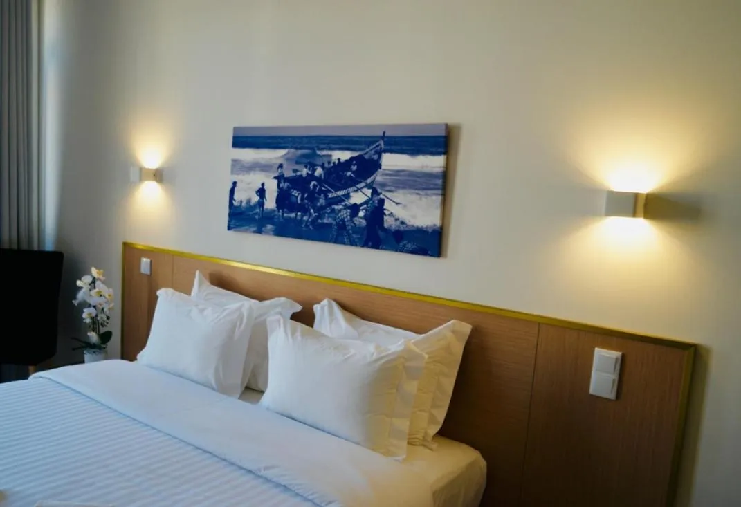 Bed in ó Poboa Guesthouse