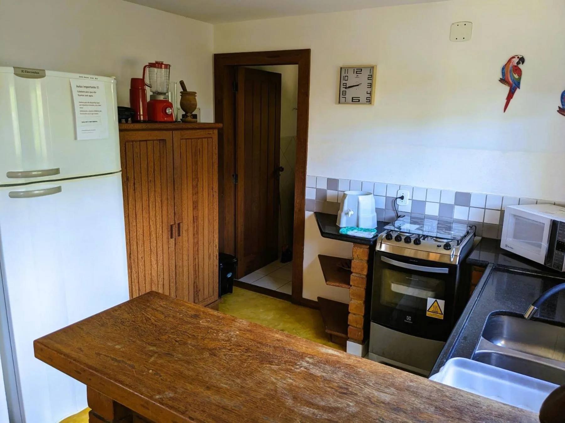 Kitchen or kitchenette in Residence Maria Vittoria Praia Arraial