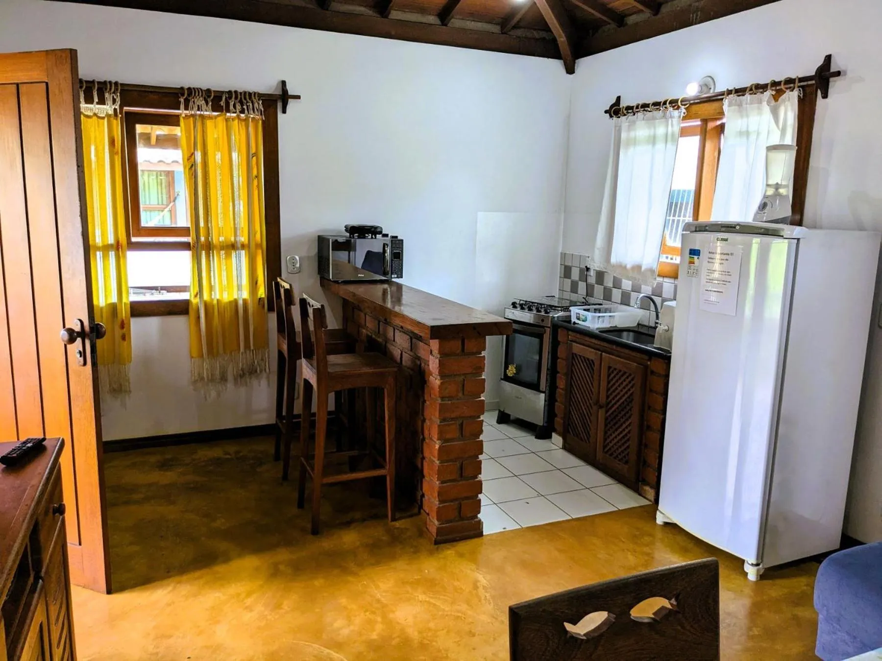 Kitchen or kitchenette in Residence Maria Vittoria Praia Arraial