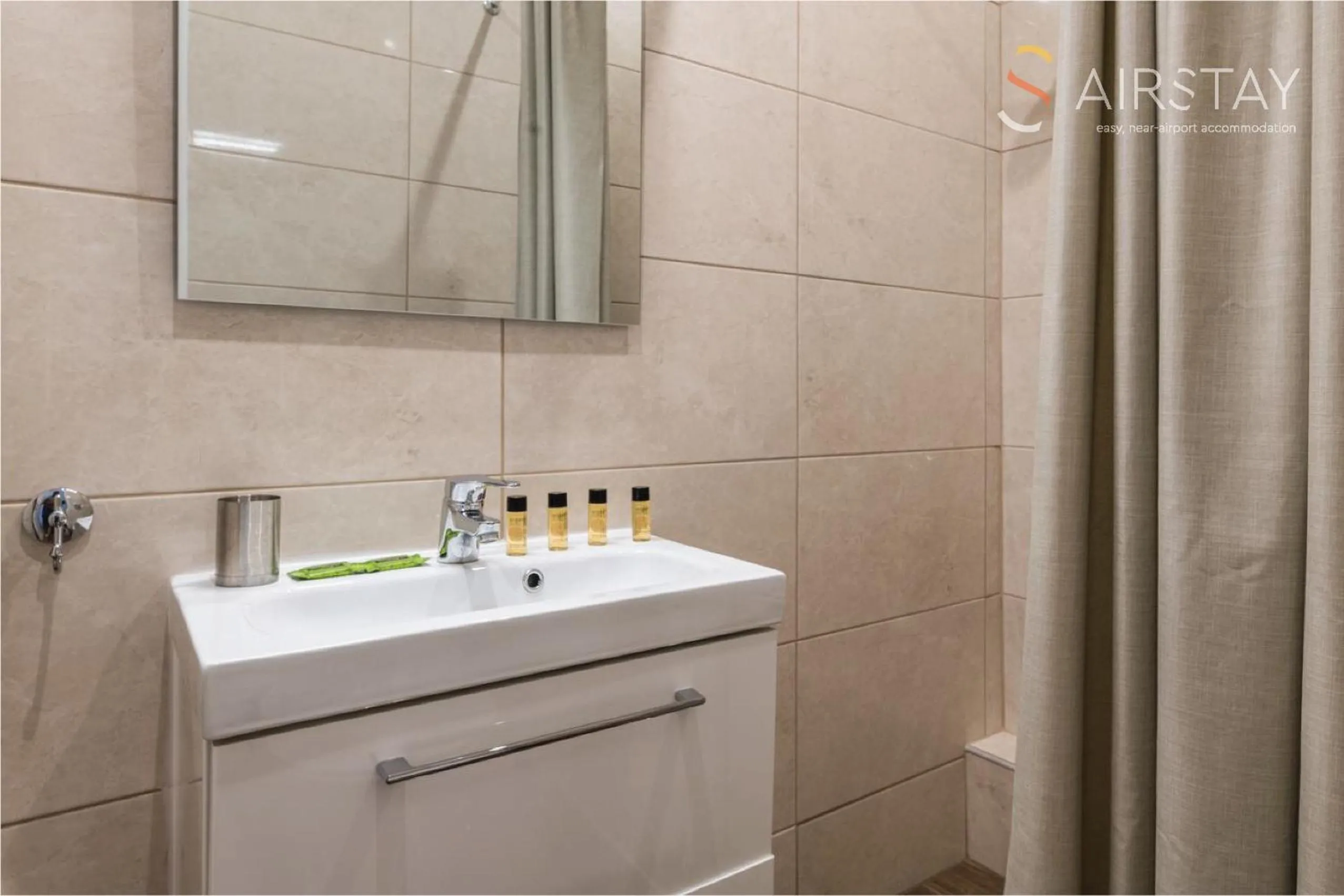 Shower in Anivia Apartments Airport by Airstay