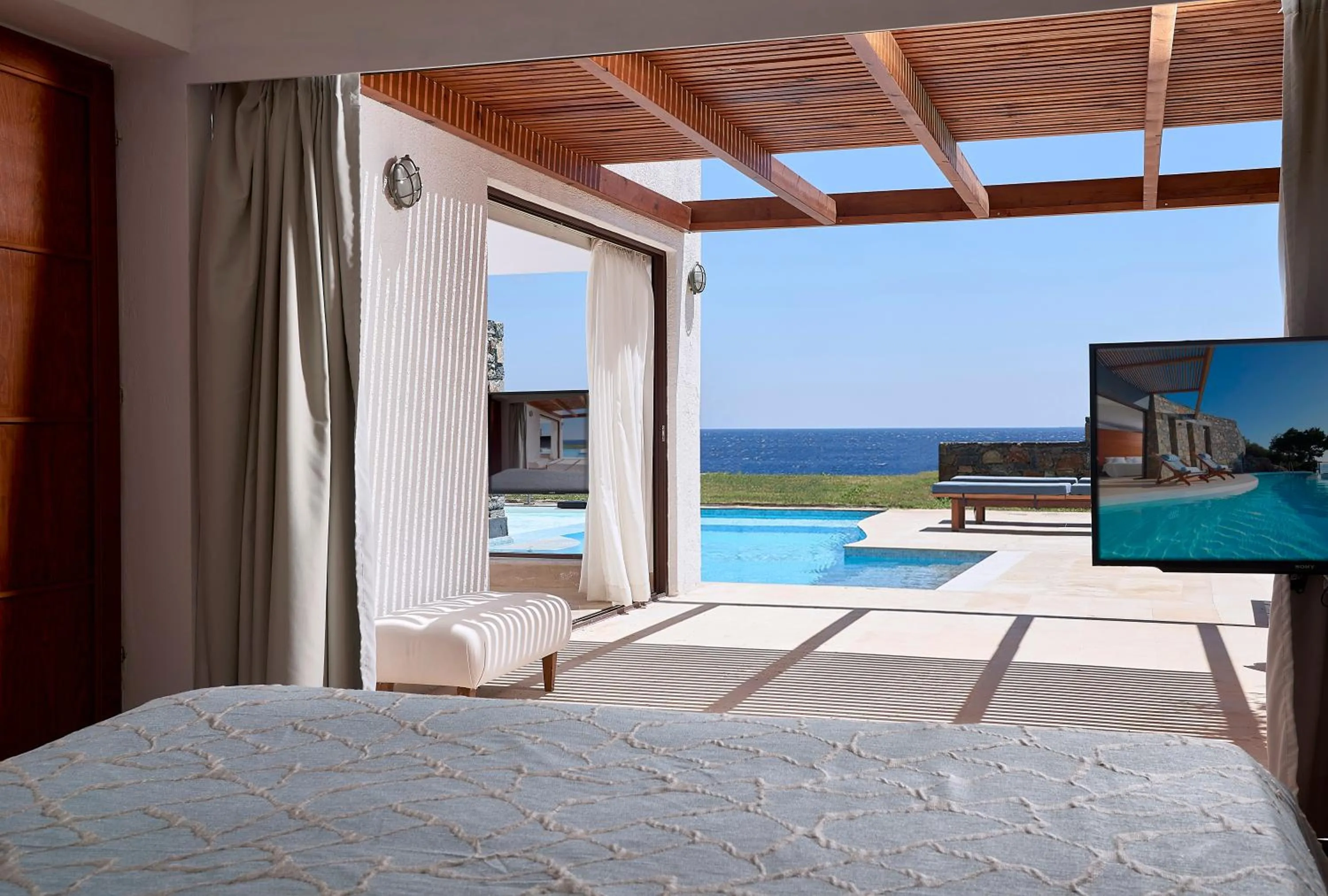 Bedroom, Bed in St. Nicolas Bay Resort Hotel & Villas