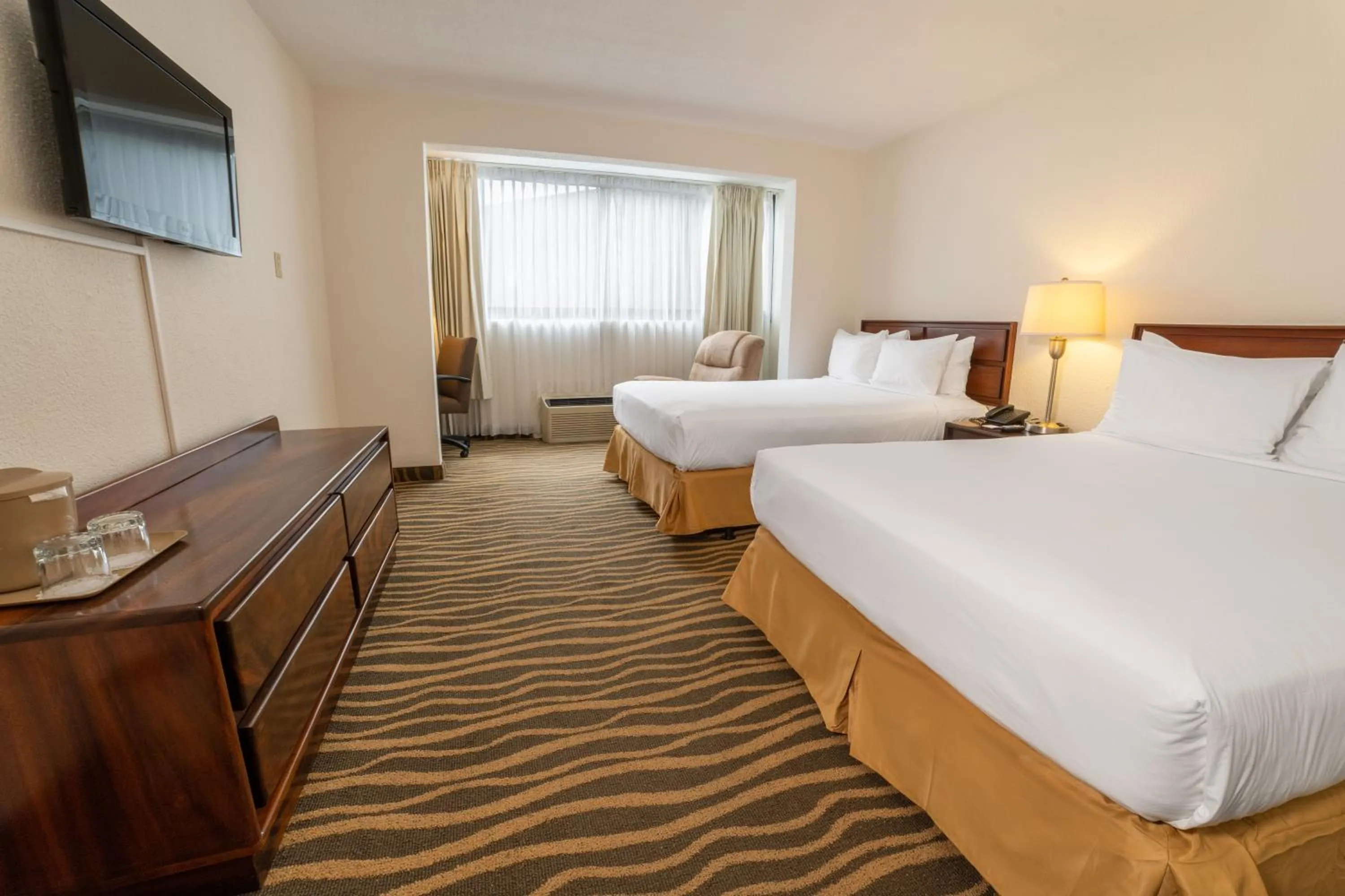 Bedroom, Bed in Irazú Hotel & Studios