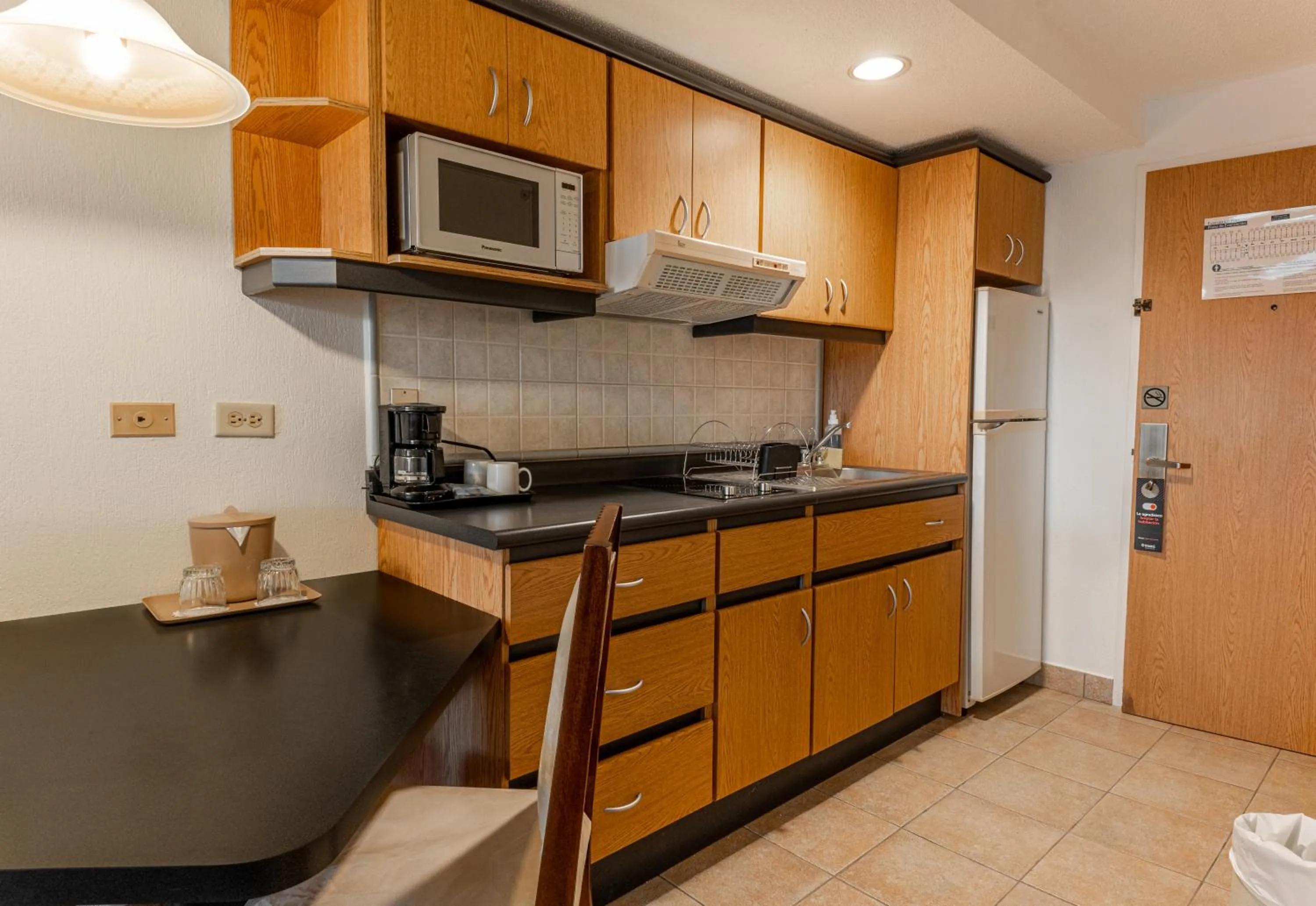 Kitchen or kitchenette in Irazú Hotel & Studios