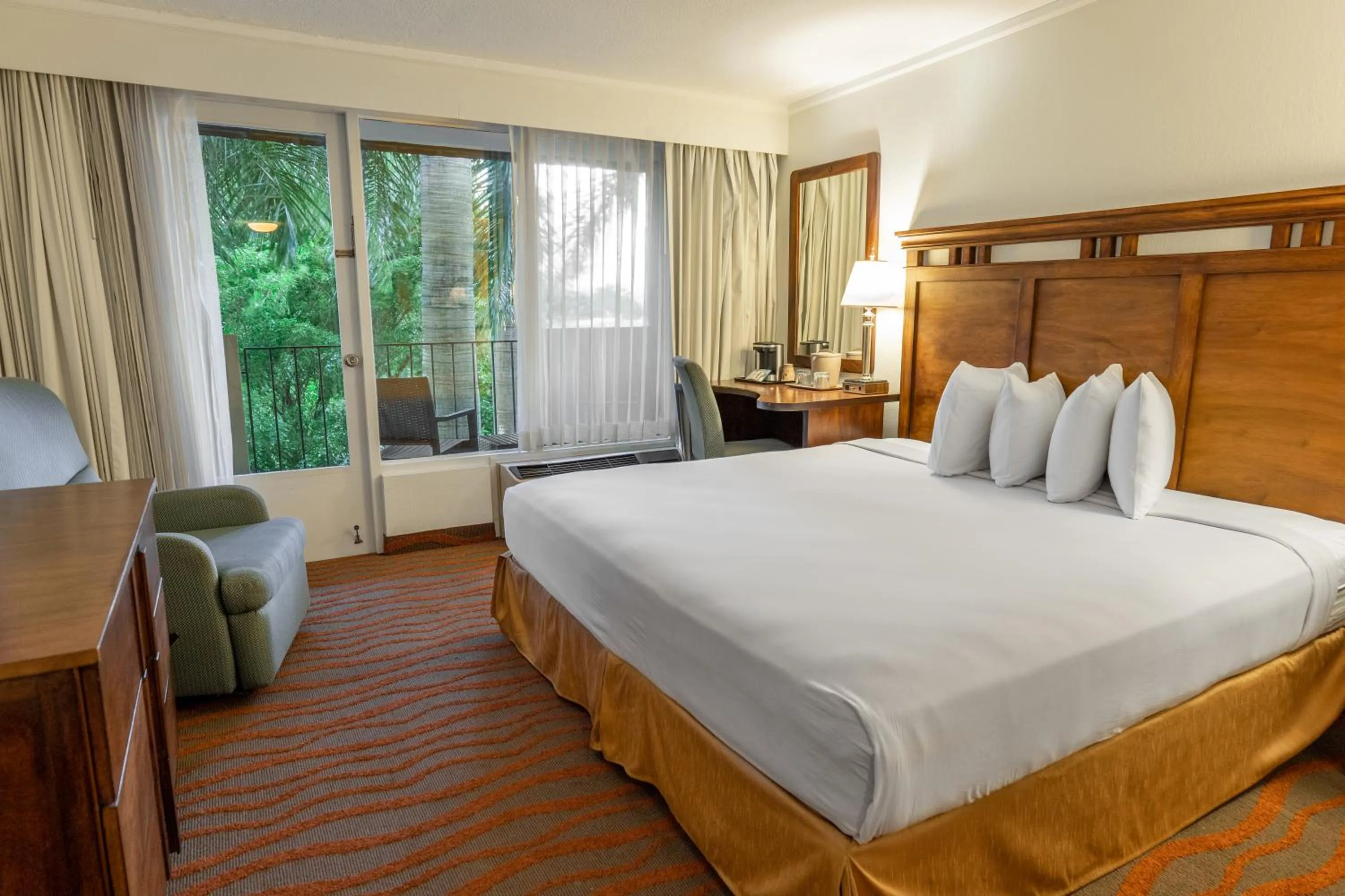 Bed in Irazú Hotel & Studios