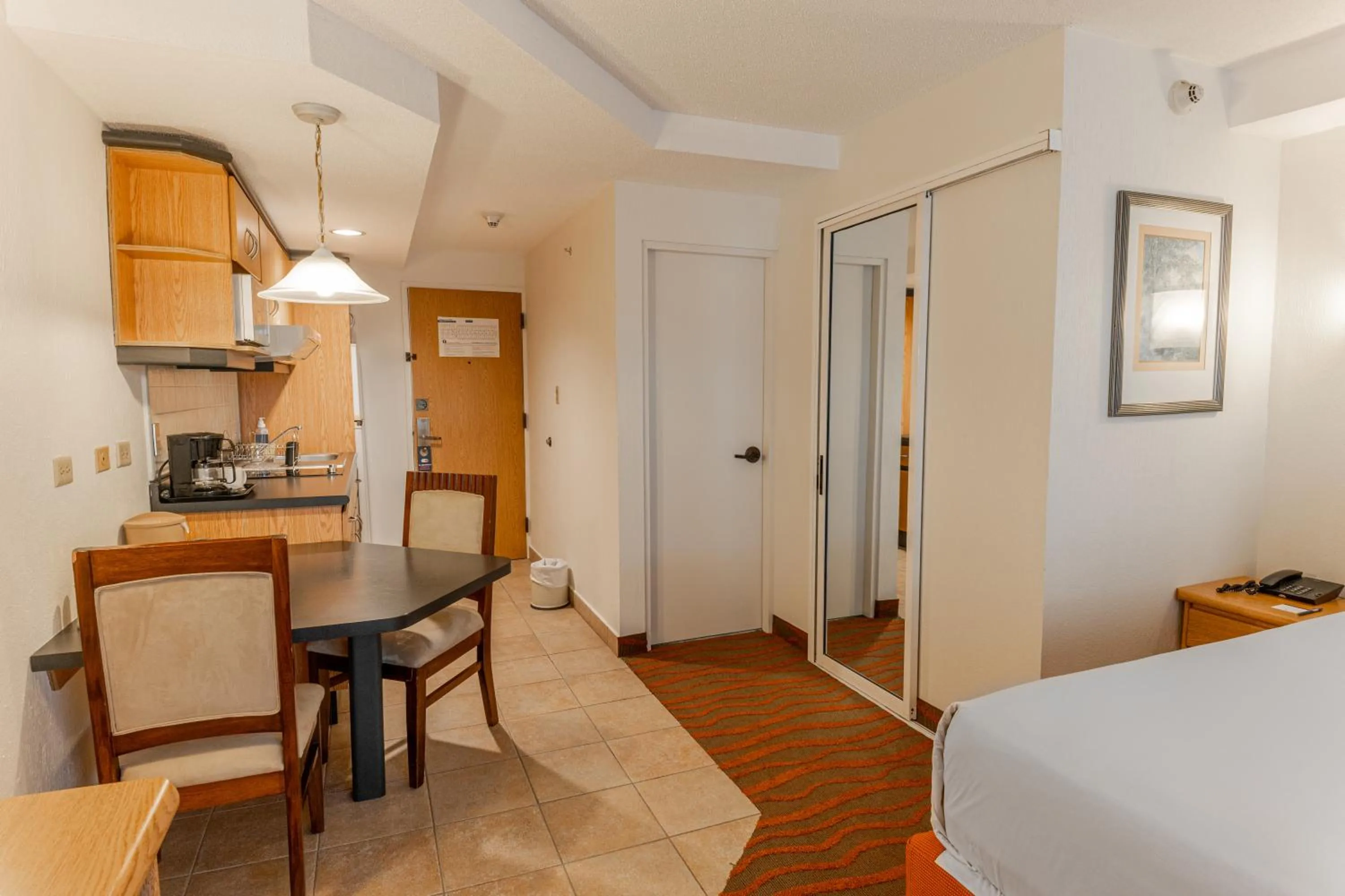 Bedroom, Bed in Irazú Hotel & Studios