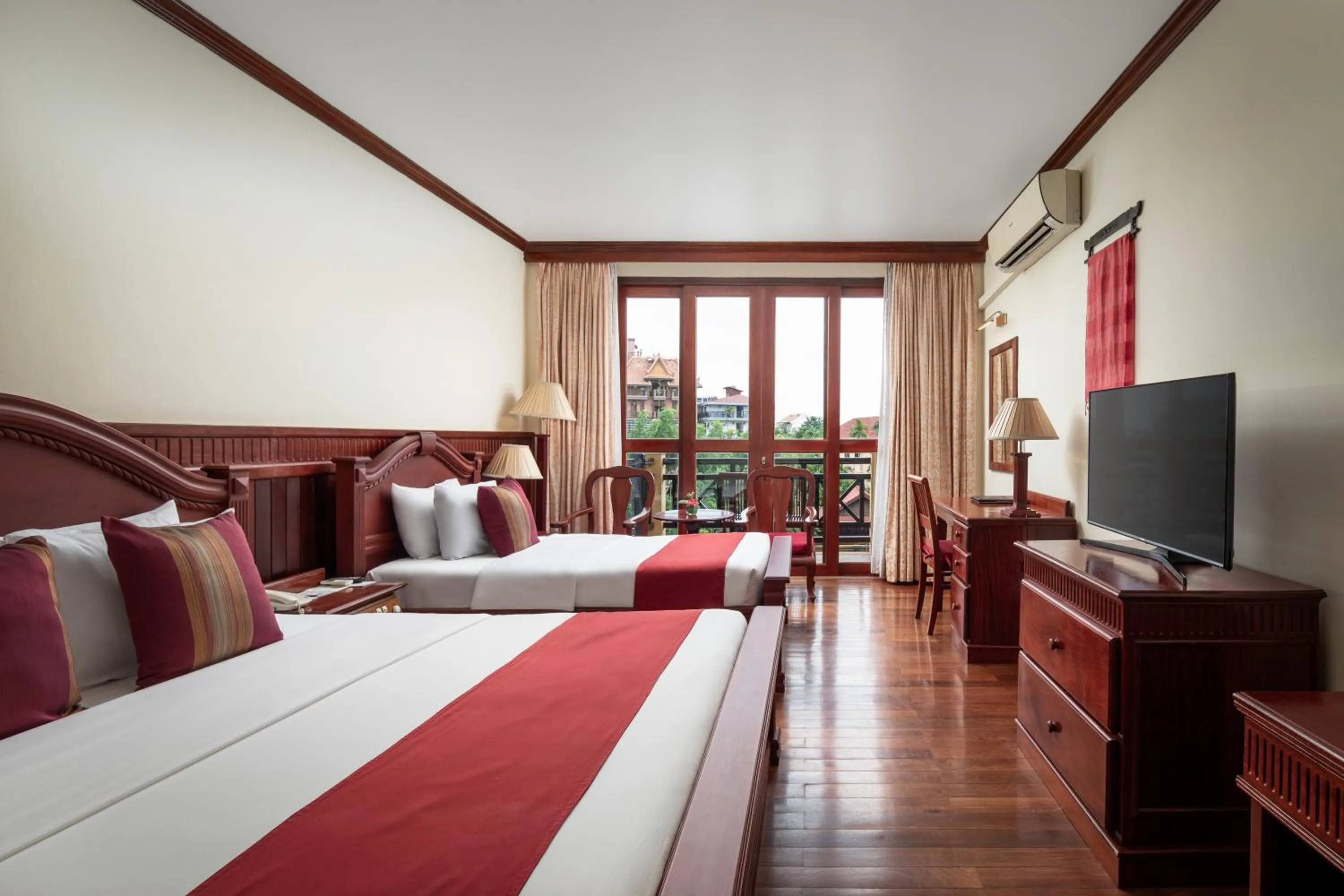 Photo of the whole room, Bed in Angkor Paradise Hotel