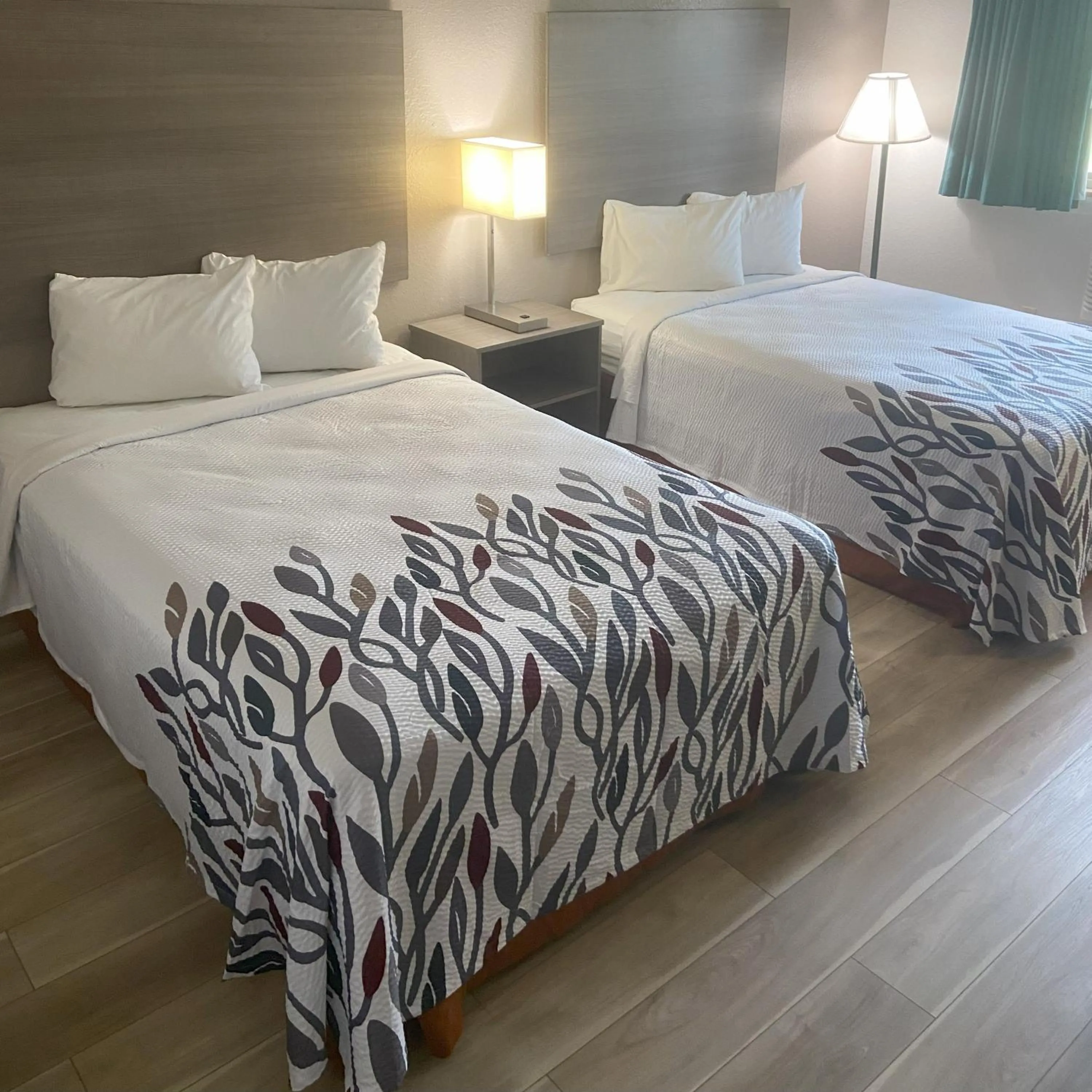 Bed in Red Roof Inn Queensbury