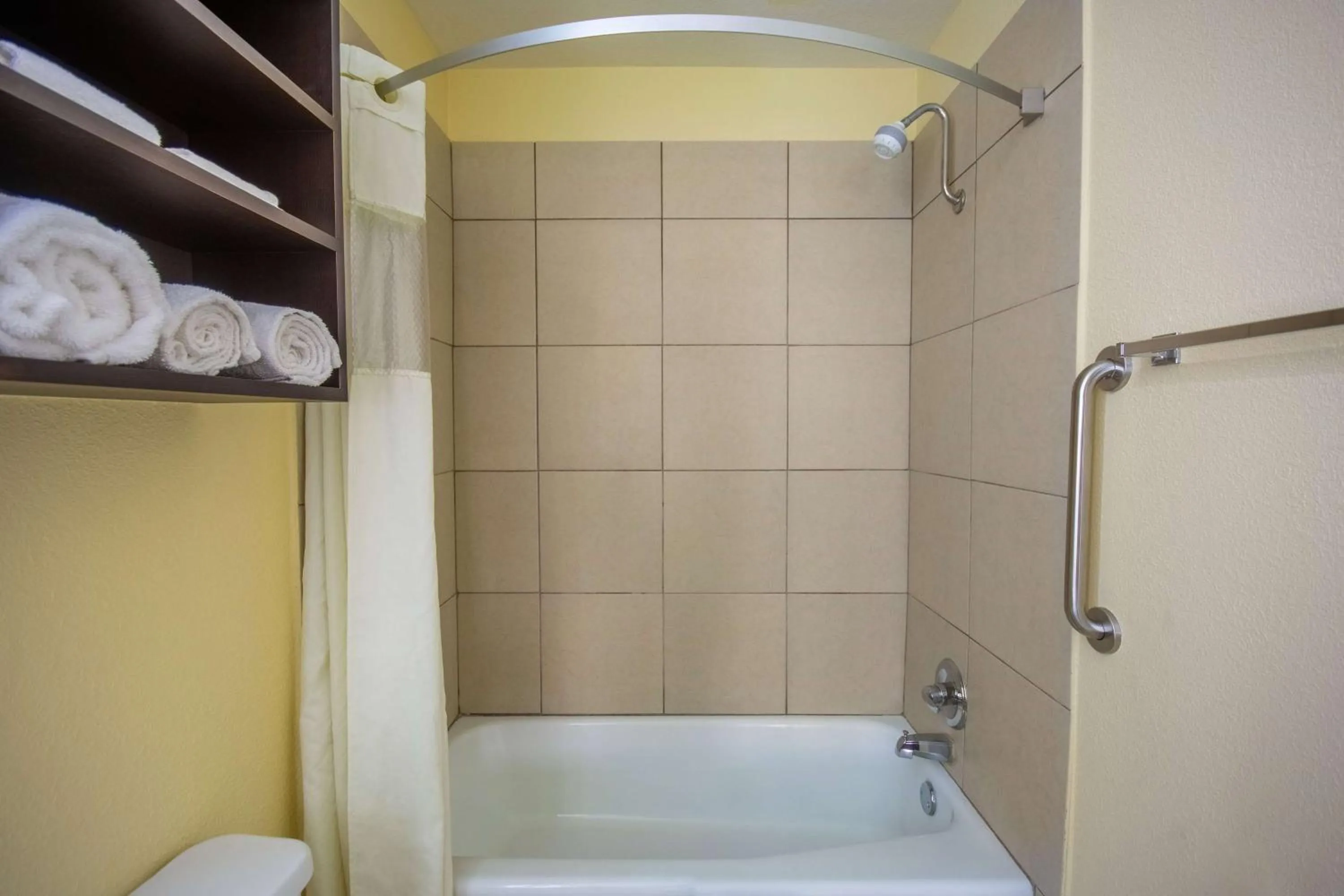 Bathroom in Days Inn & Suites by Wyndham Waterloo