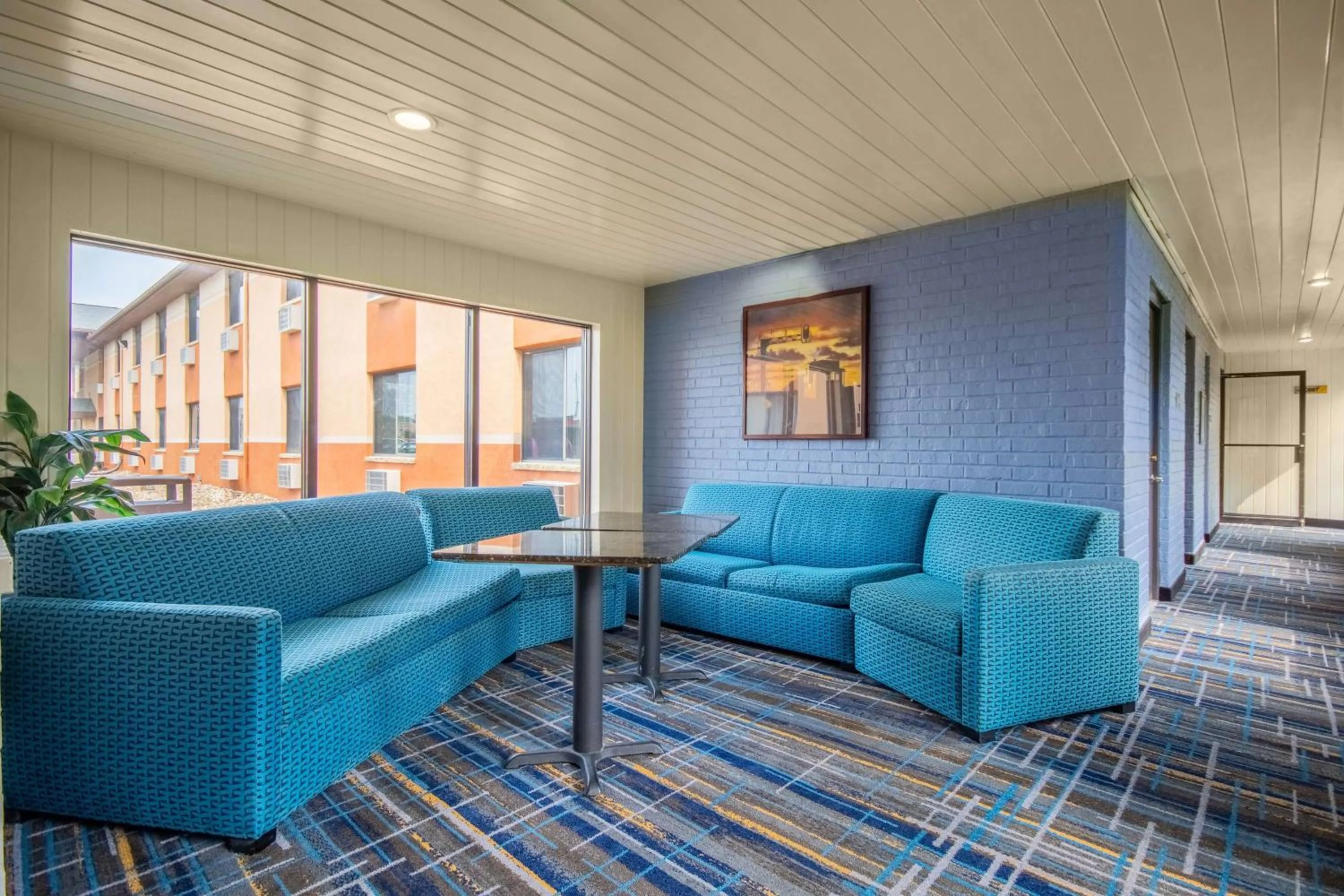 Lobby or reception in Days Inn & Suites by Wyndham Waterloo
