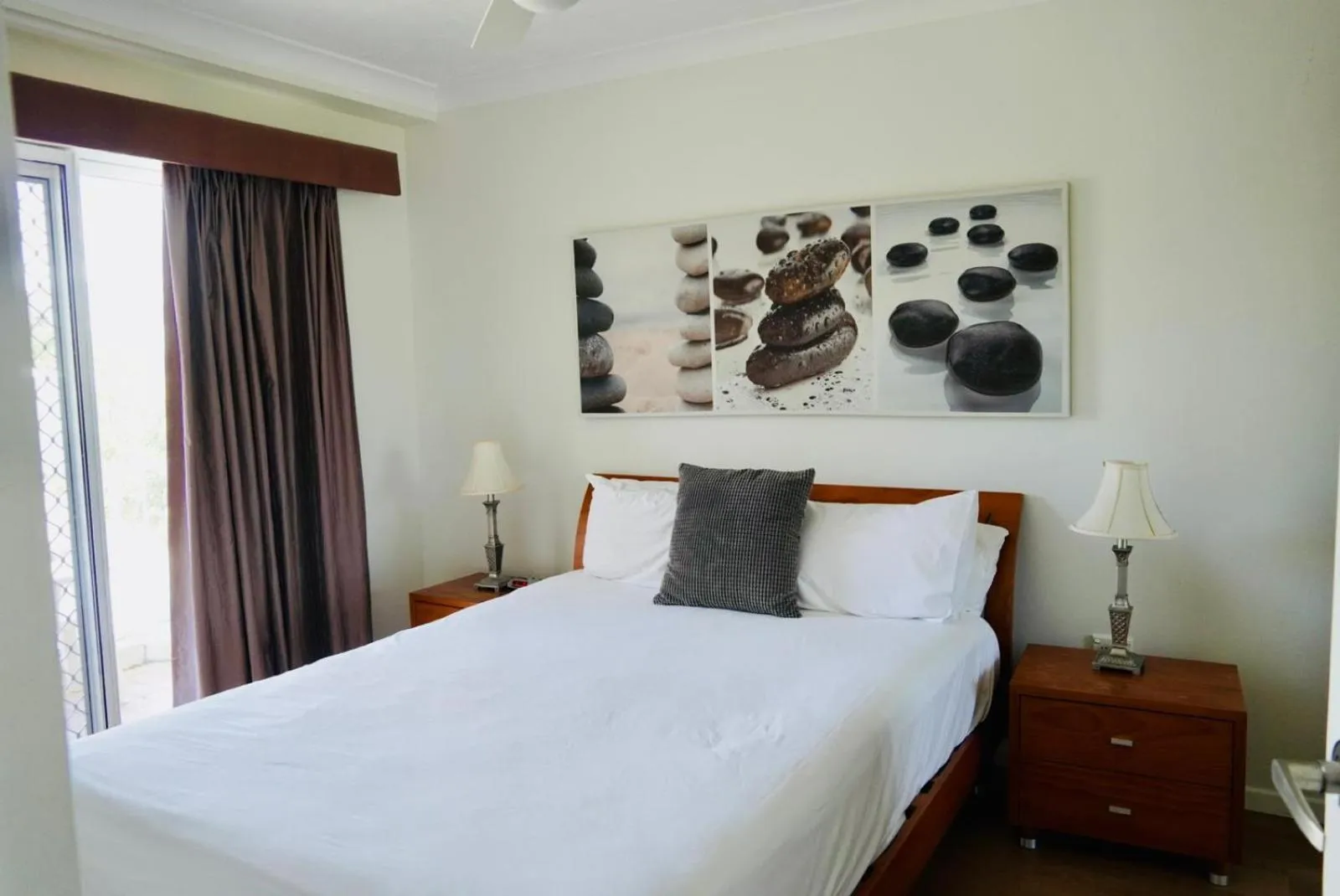 Bed in Pelican Cove Waterfront Apartment