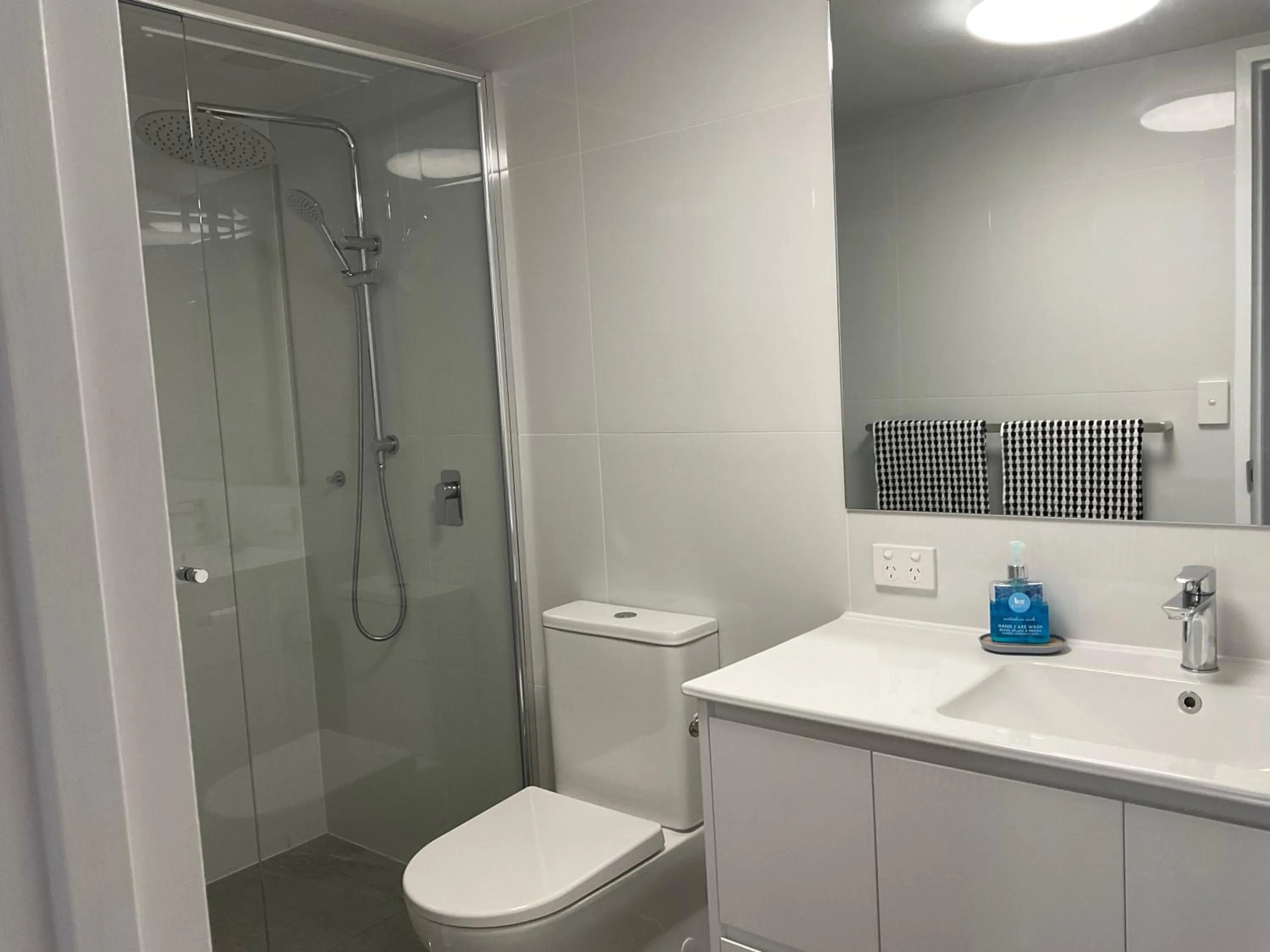 Shower in Pelican Cove Waterfront Apartment