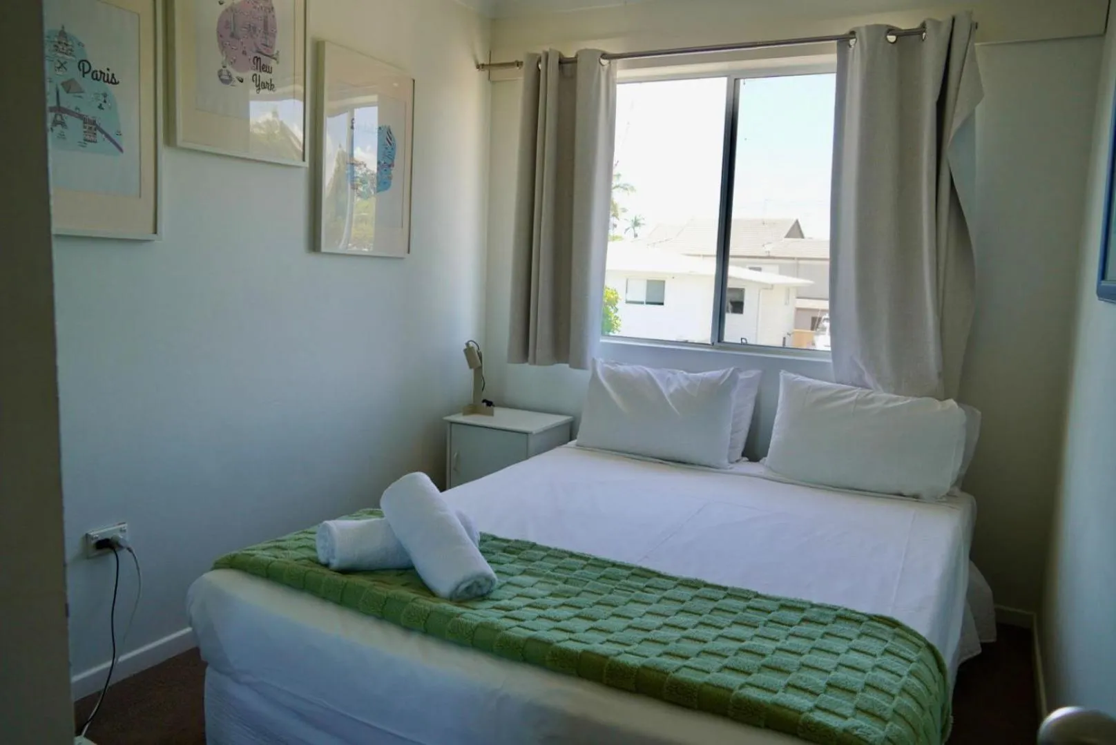 Bed in Pelican Cove Waterfront Apartment