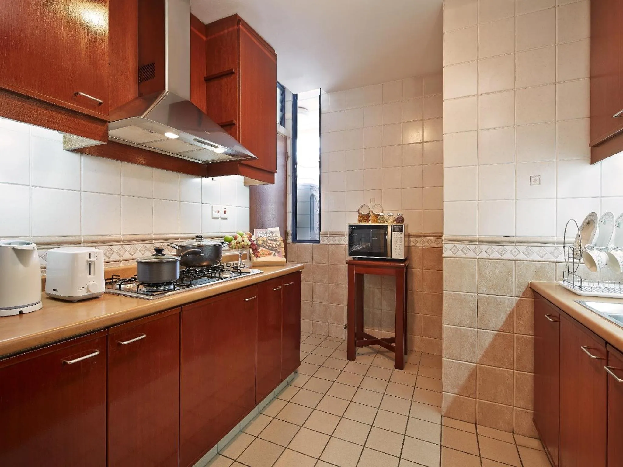 Kitchen or kitchenette in Village Residence Robertson Quay by Far East Hospitality