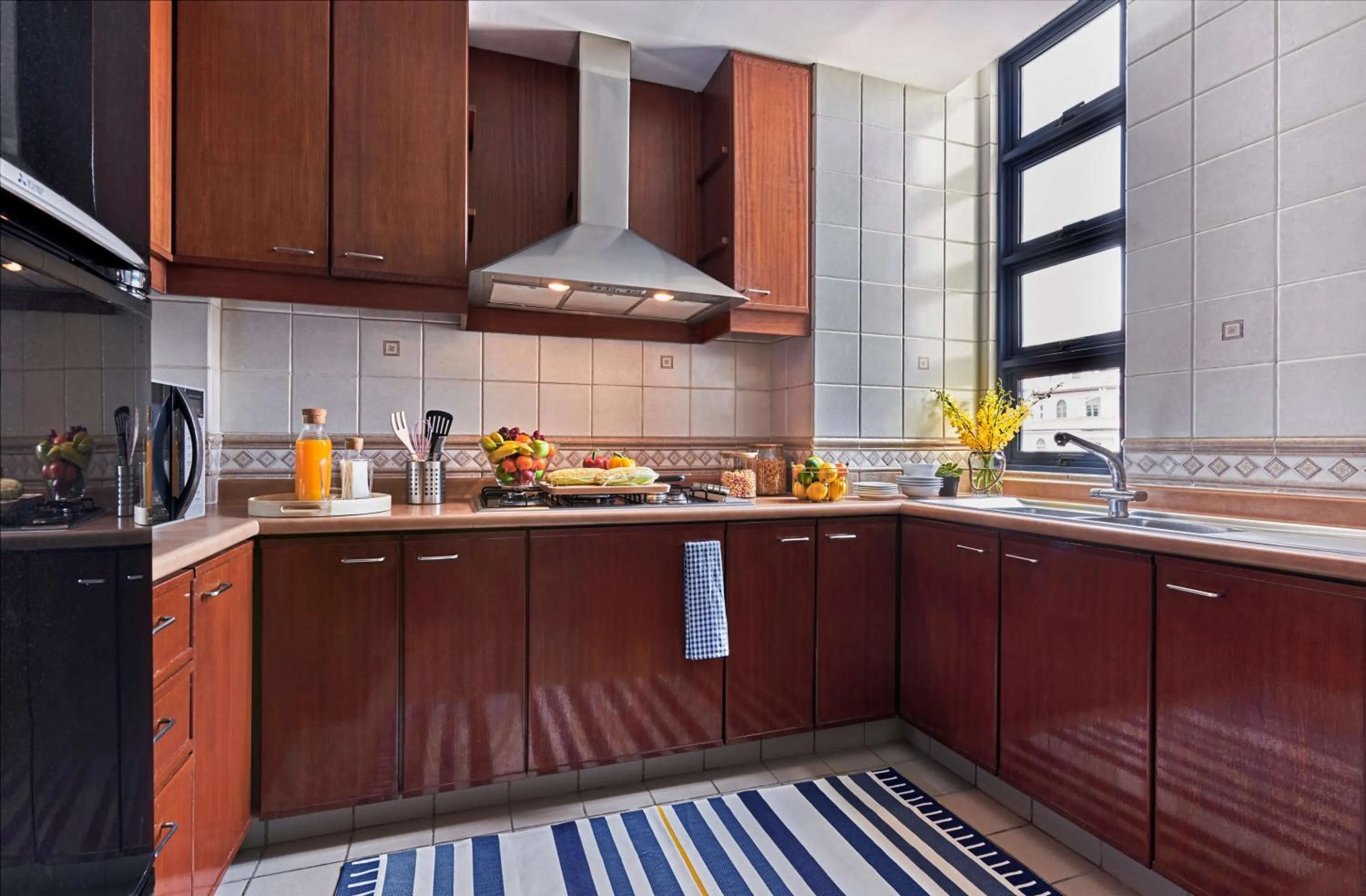 kitchen in Village Residence Robertson Quay by Far East Hospitality