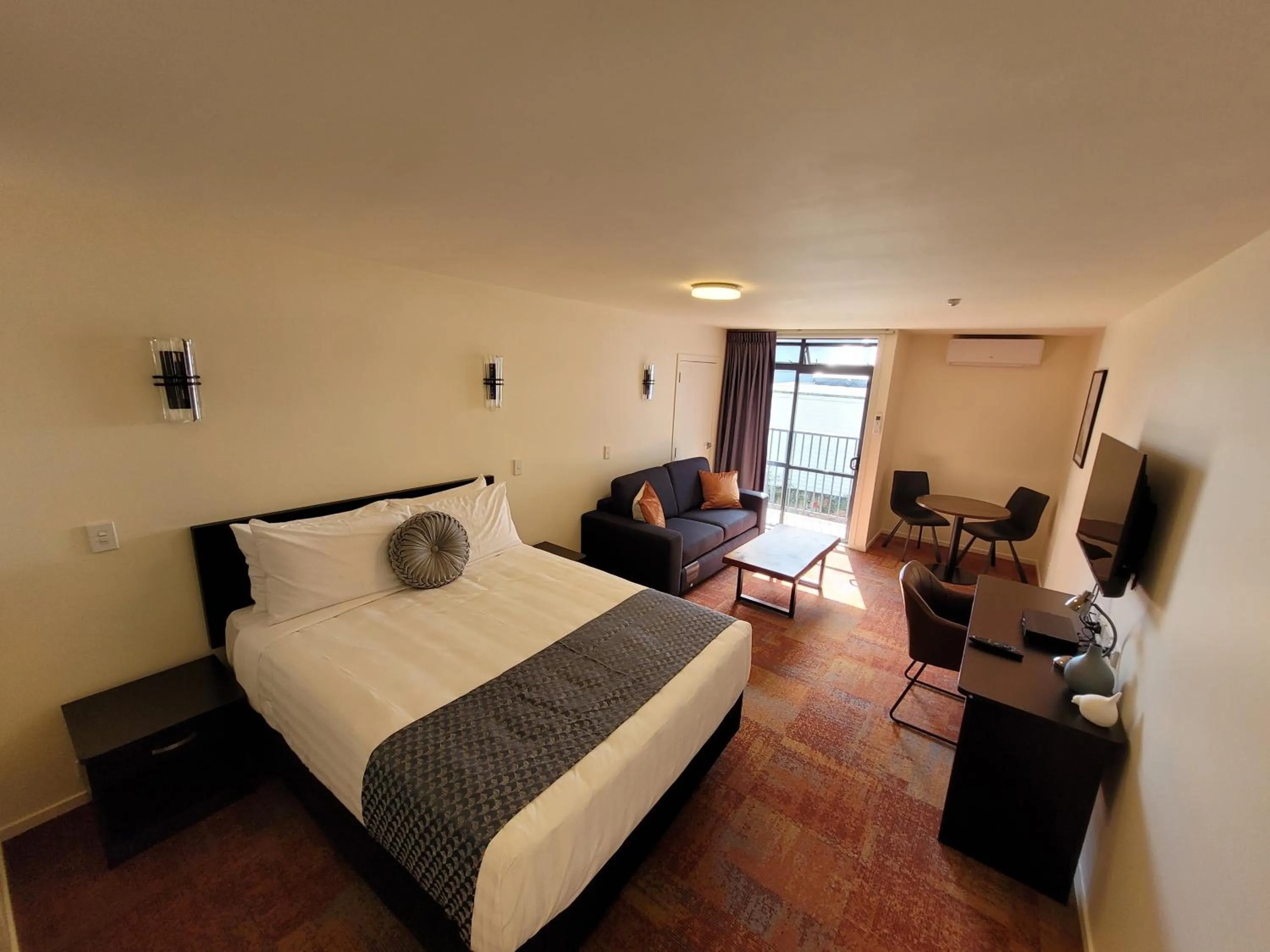 Bed in City of Sails Motel