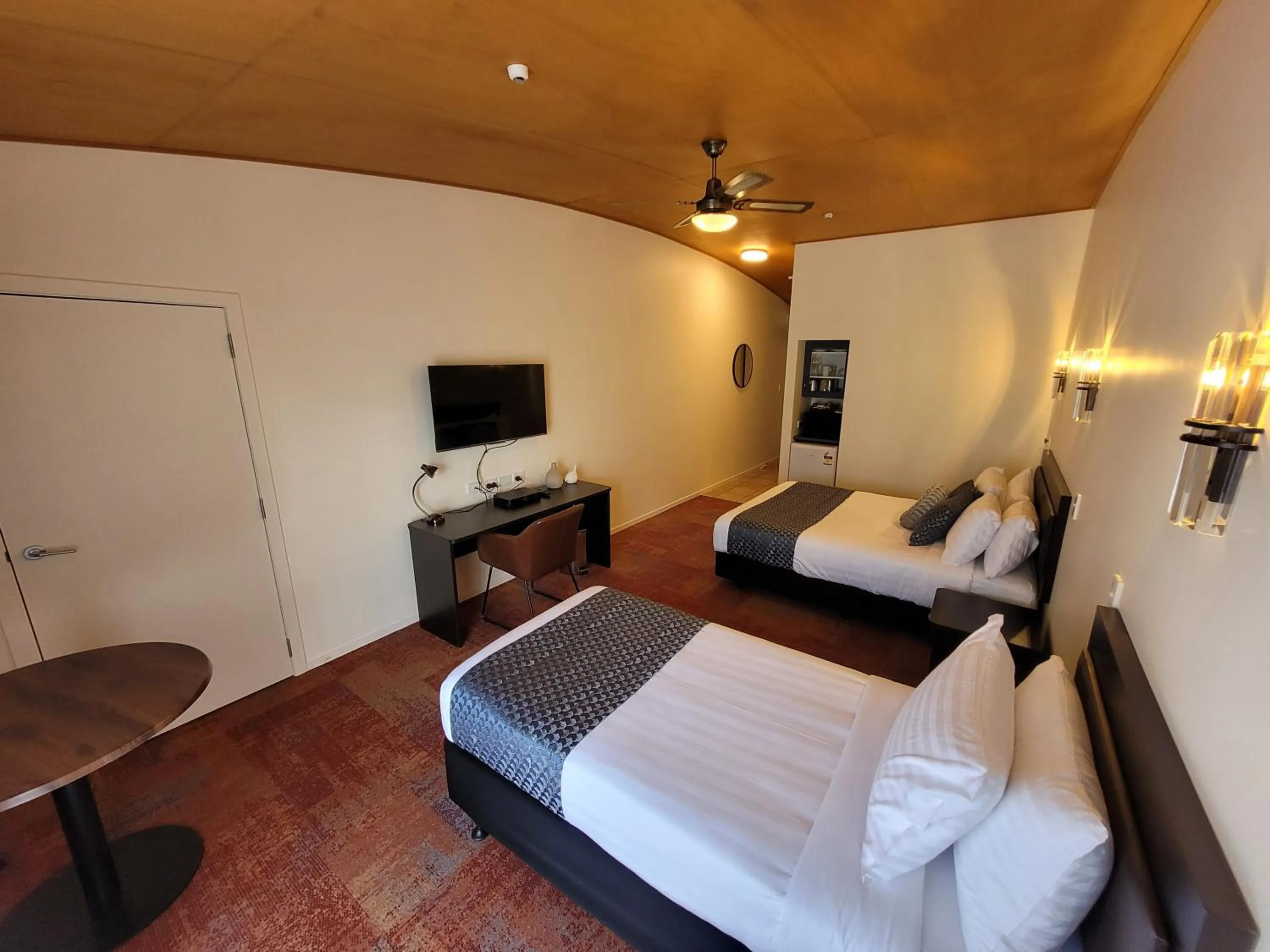 Bed in City of Sails Motel