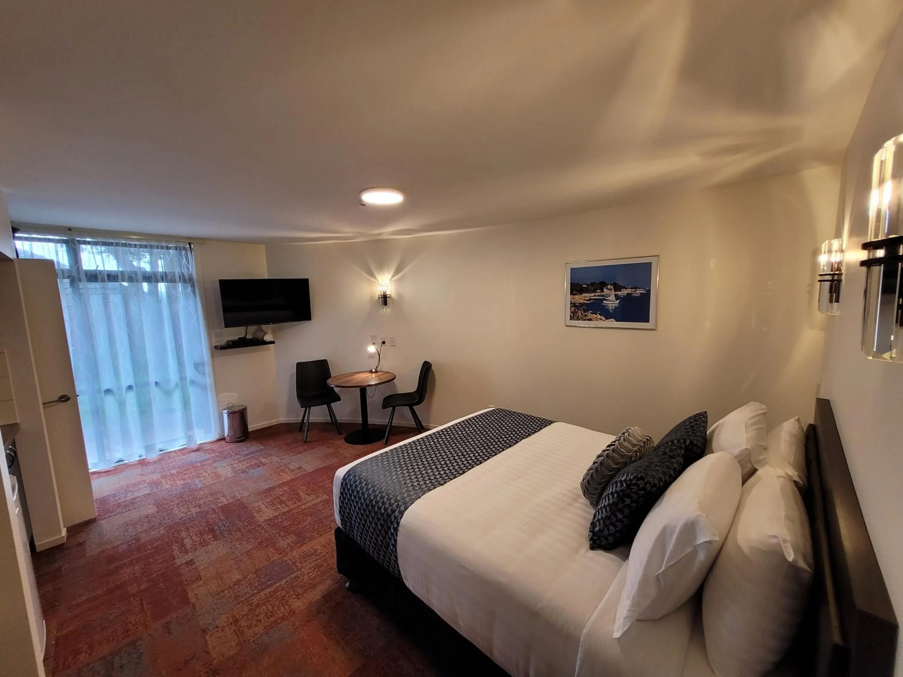 Bed in City of Sails Motel