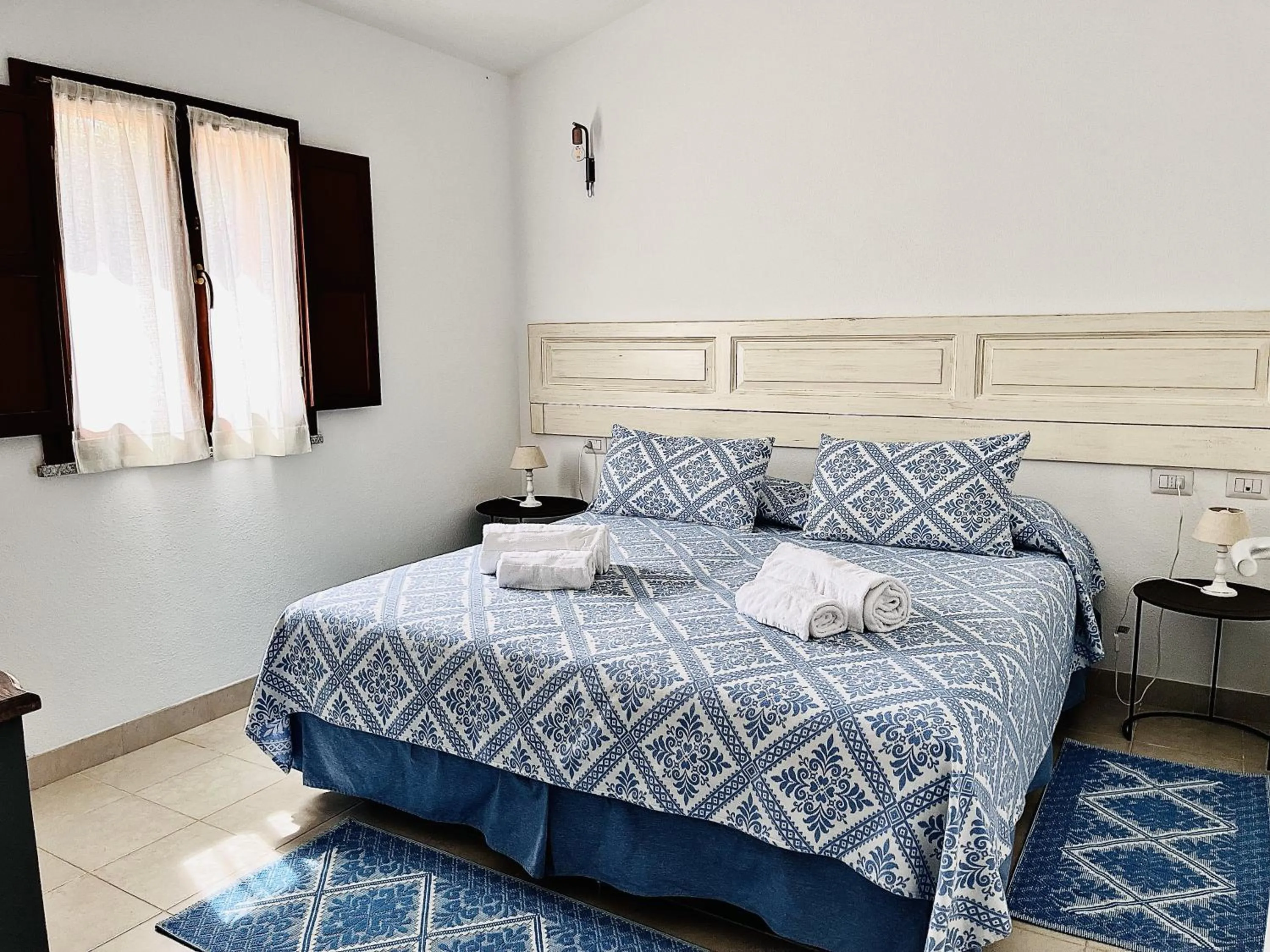 Bed in Casagliana Suite Resort