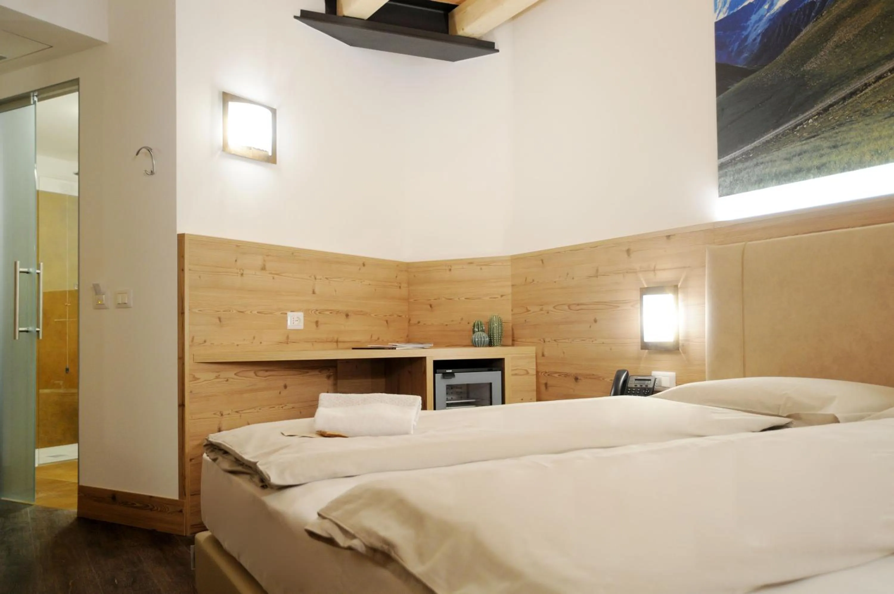 Bed in TOURING HOTEL & SPA