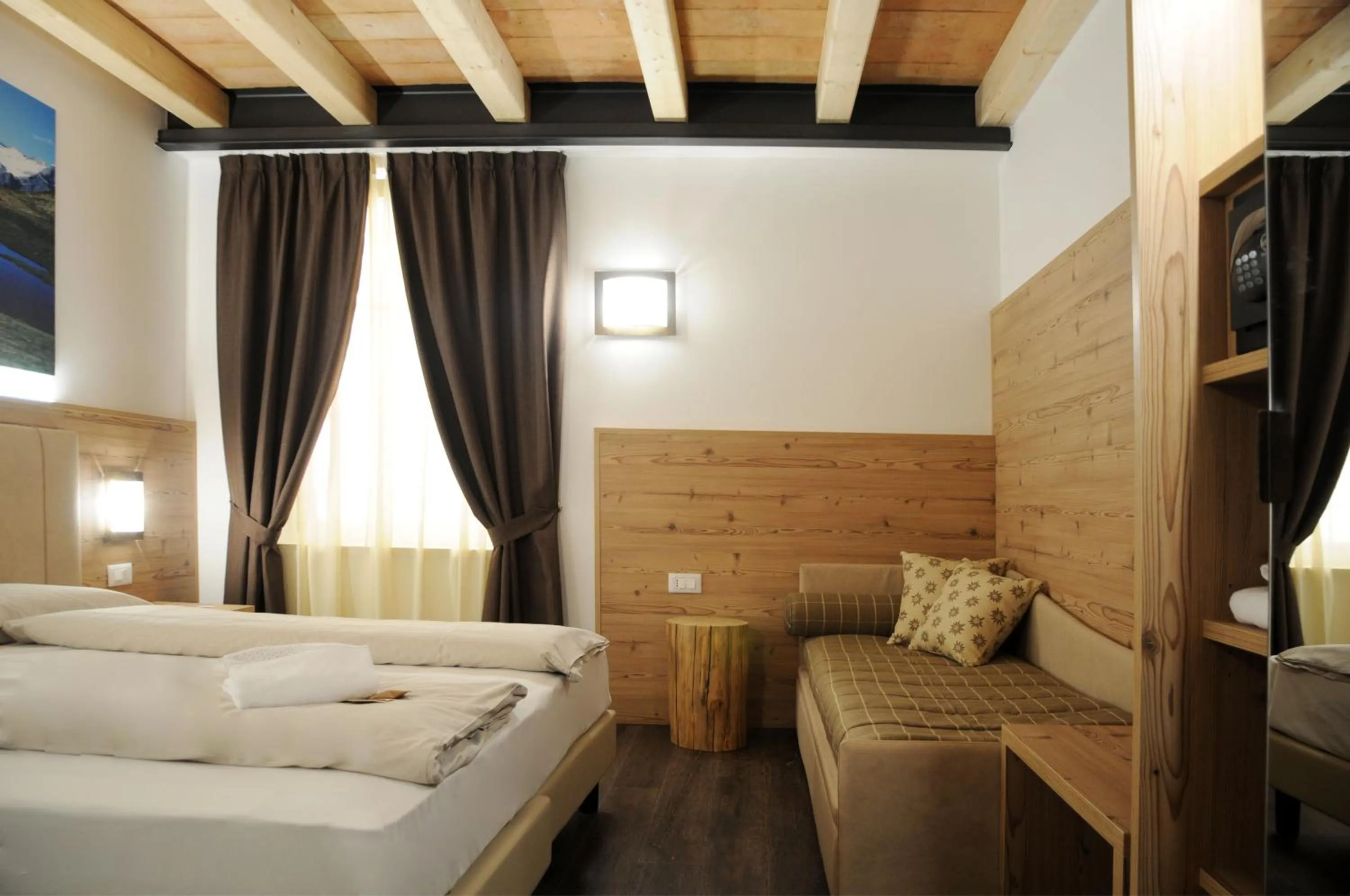 Bed in TOURING HOTEL & SPA