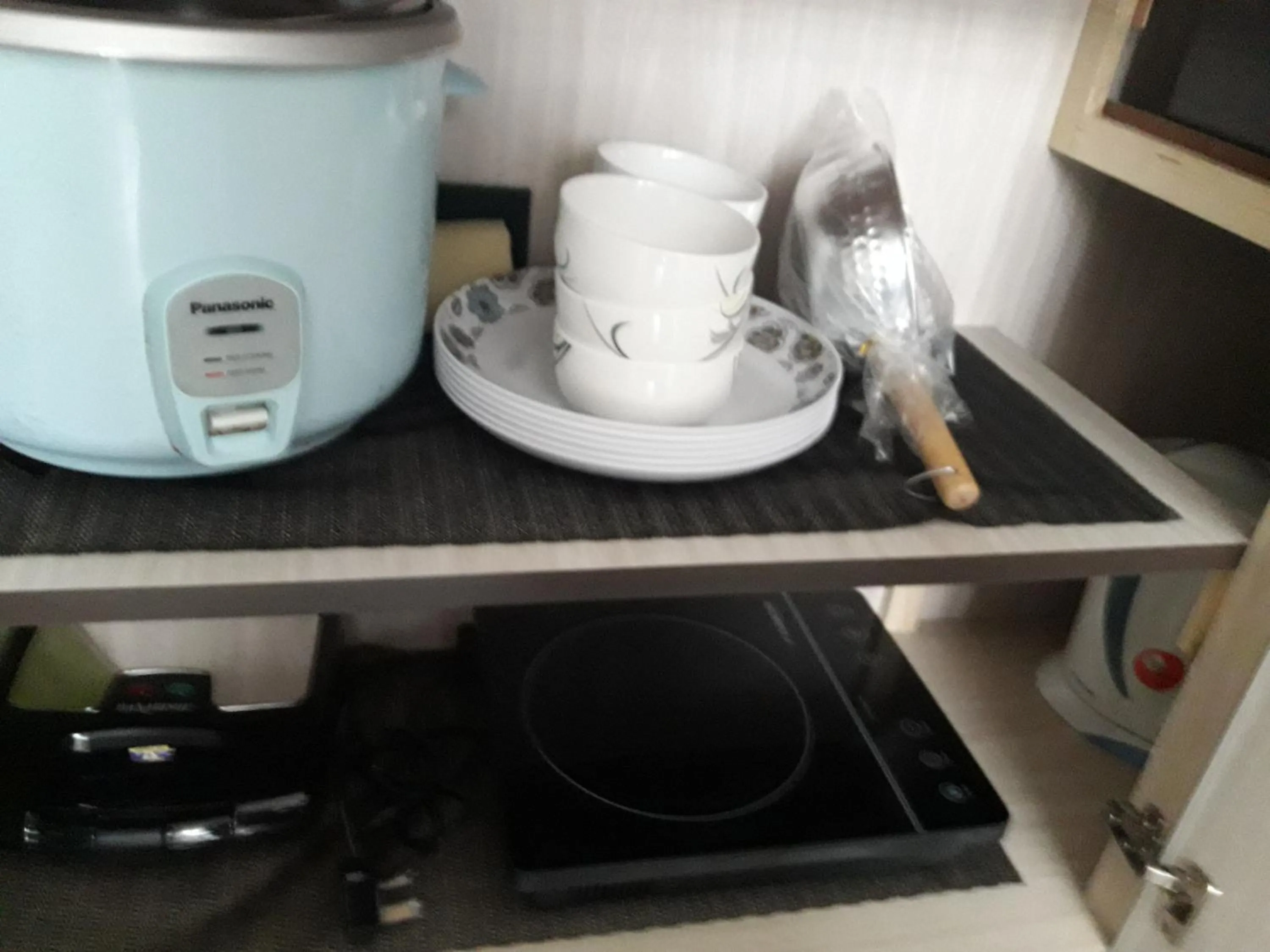 Kitchen or kitchenette in Tampoi Homestay